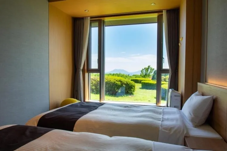 Bed in Senomoto Kogen Hotel