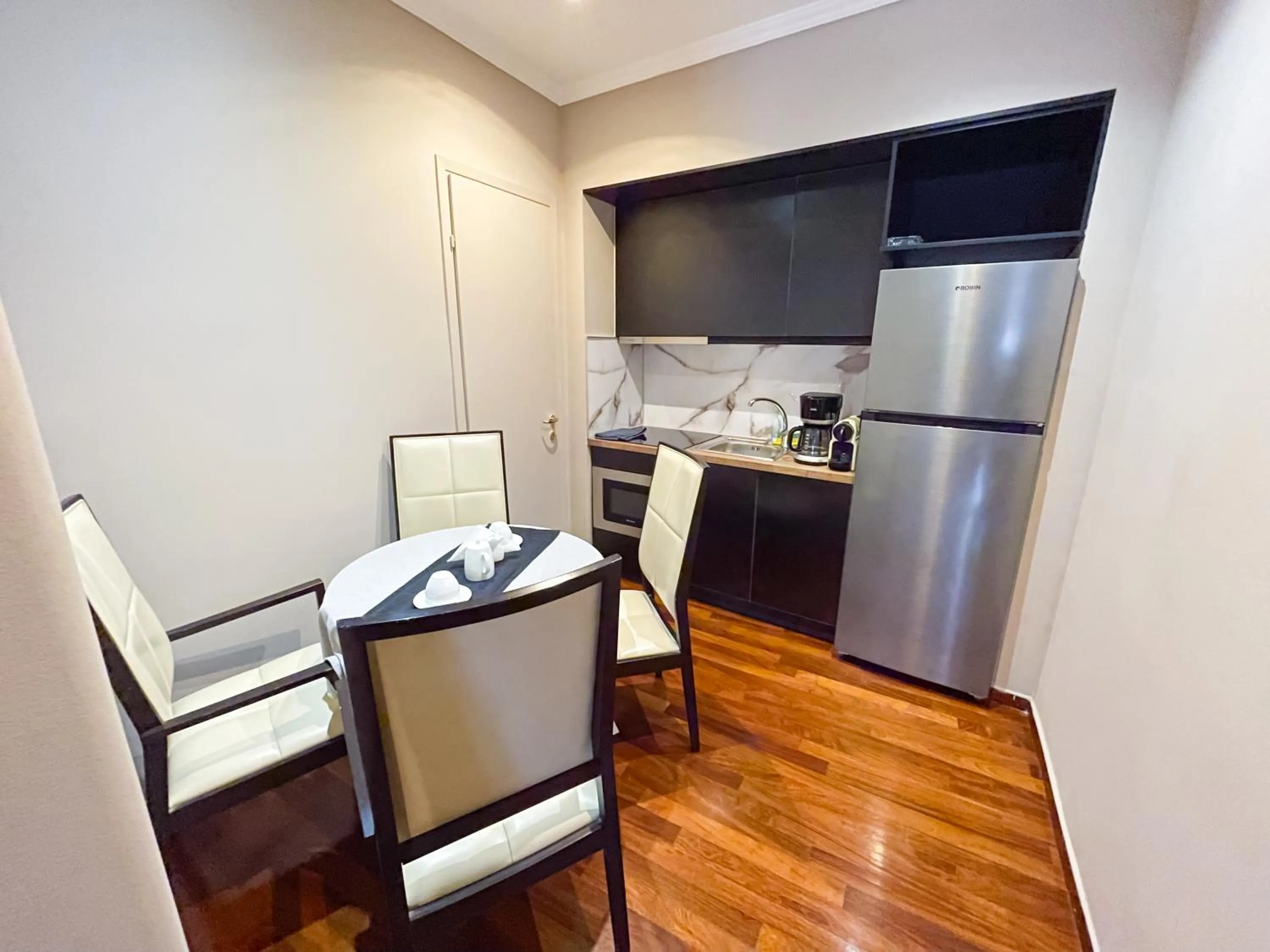 Kitchen or kitchenette in Andromeda Suites