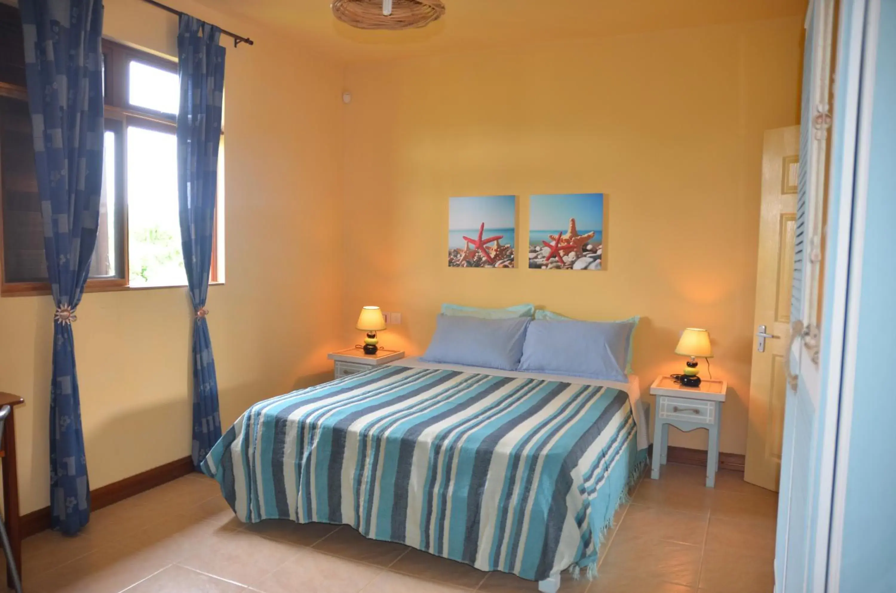 Triple Room with Garden View in La Maison Soleil Triple Room with Garden View in La Maison Soleil