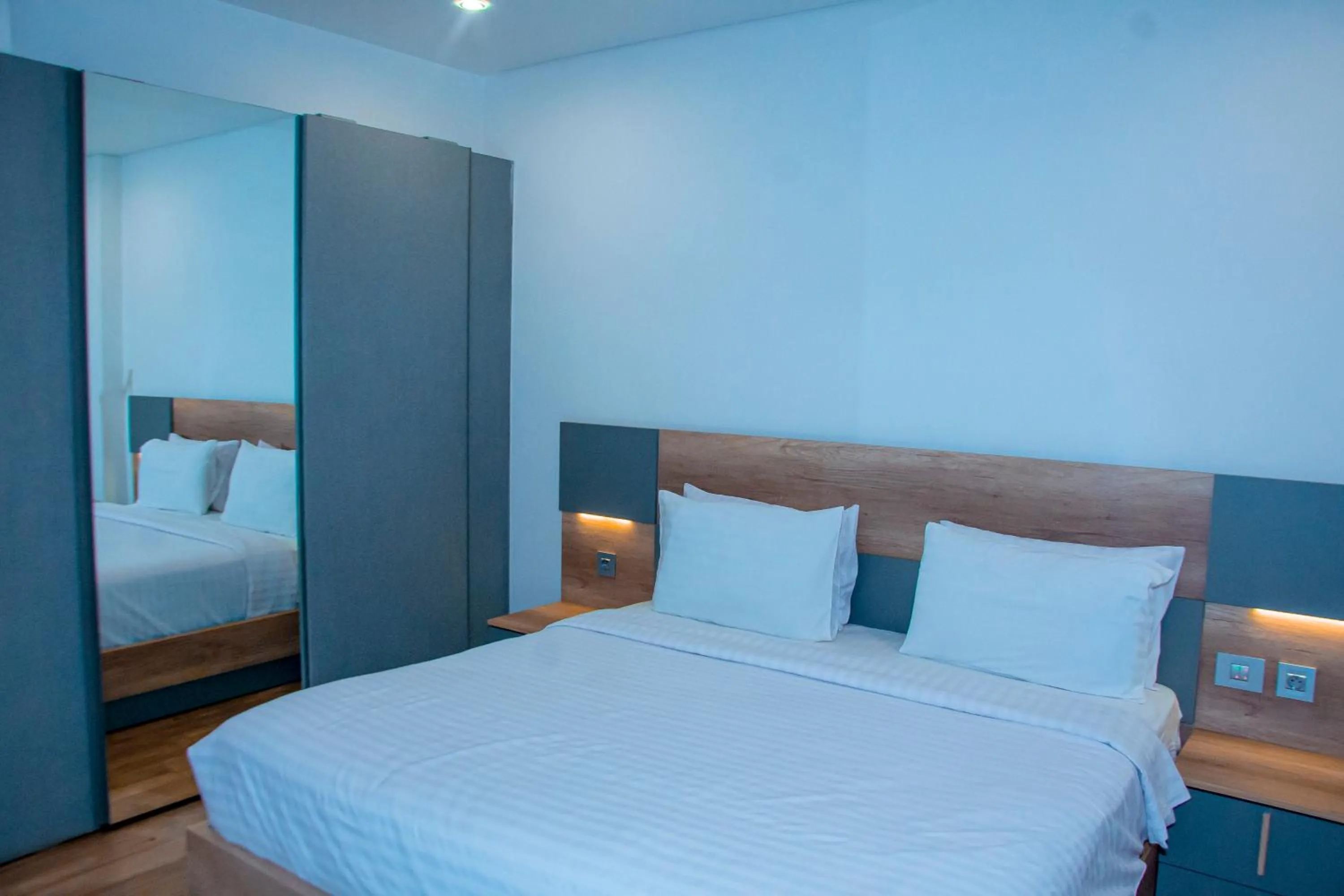 Photo of the whole room, Bed in Africa's Touch & Leisure