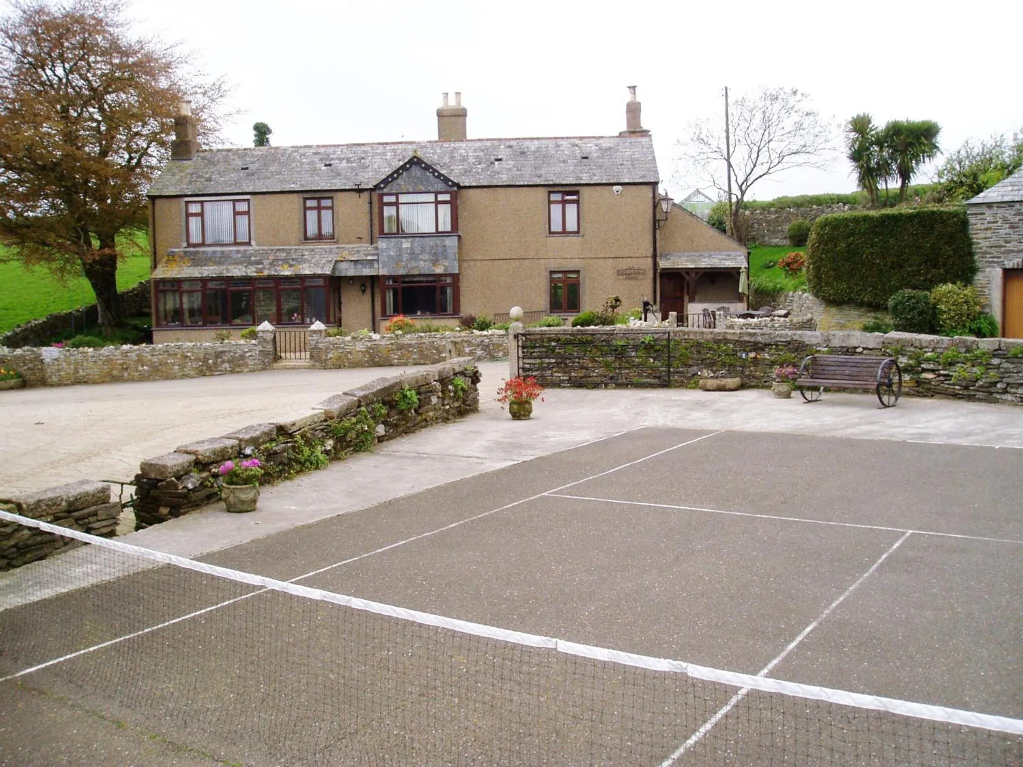 Tennis court in Tregondale Manor Farm