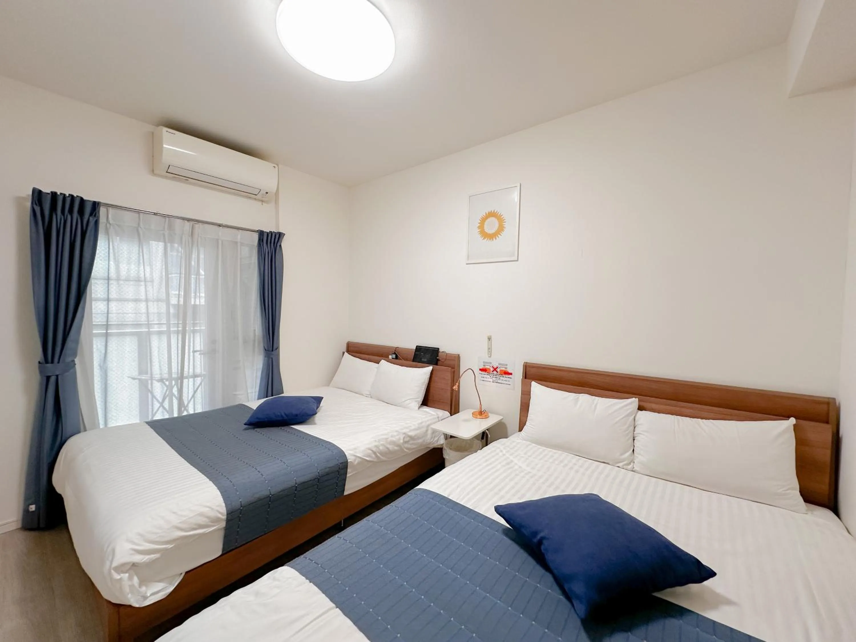 Bed in Legatio HAKATA Station East