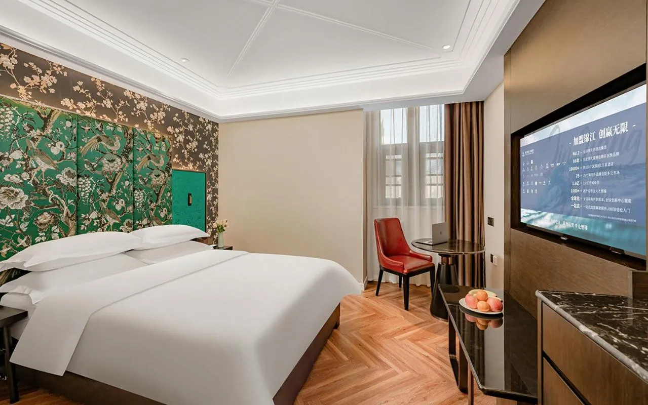 Bed in Metropolo Hotel Xuzhou High-speed Railway Station Jinlonghu