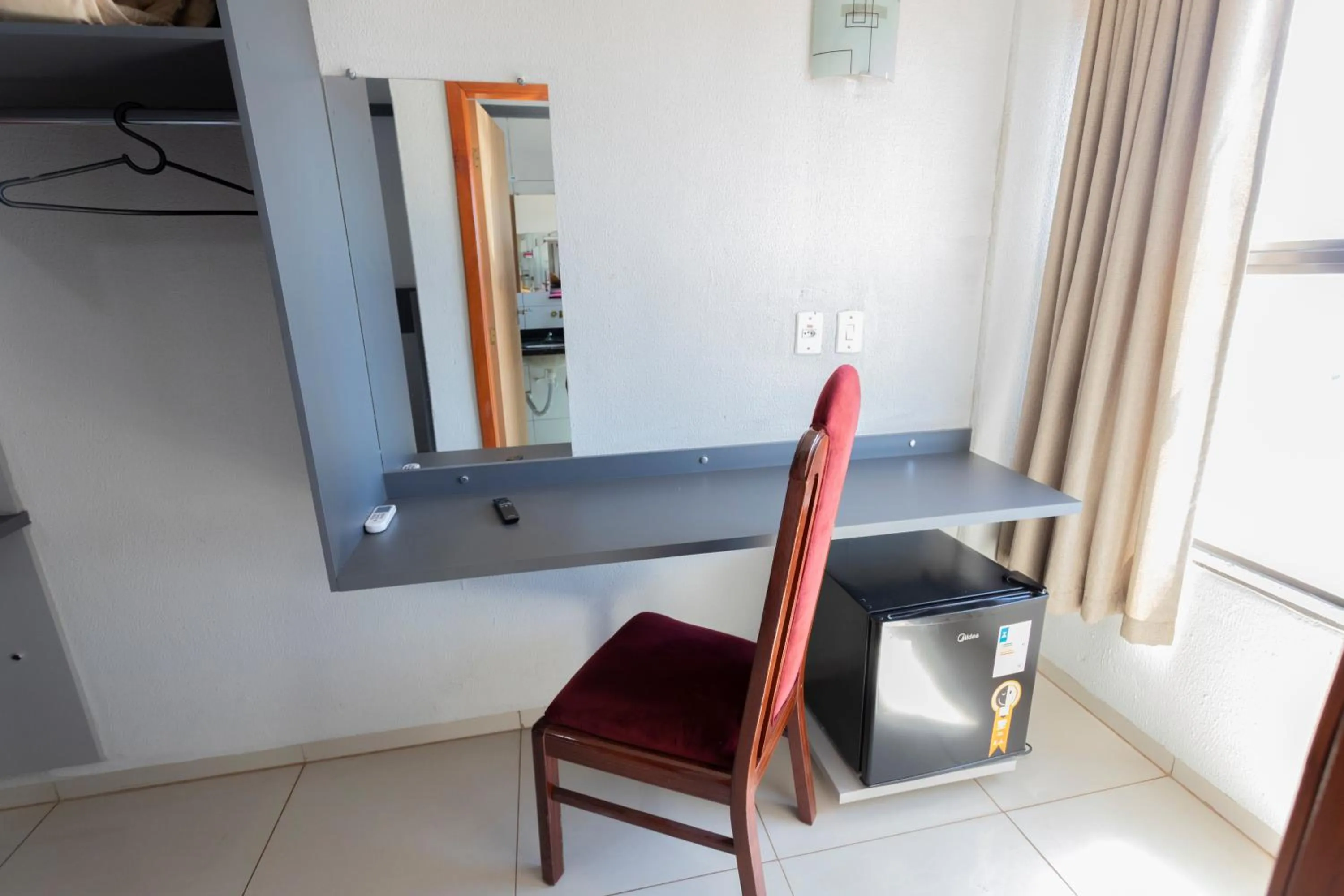 Bedroom in Turis Hotel & Choperia