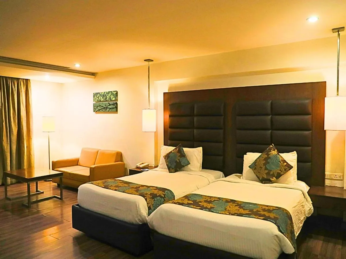 Photo of the whole room, Bed in D R Utthama Nellore - AM Hotel Kollection
