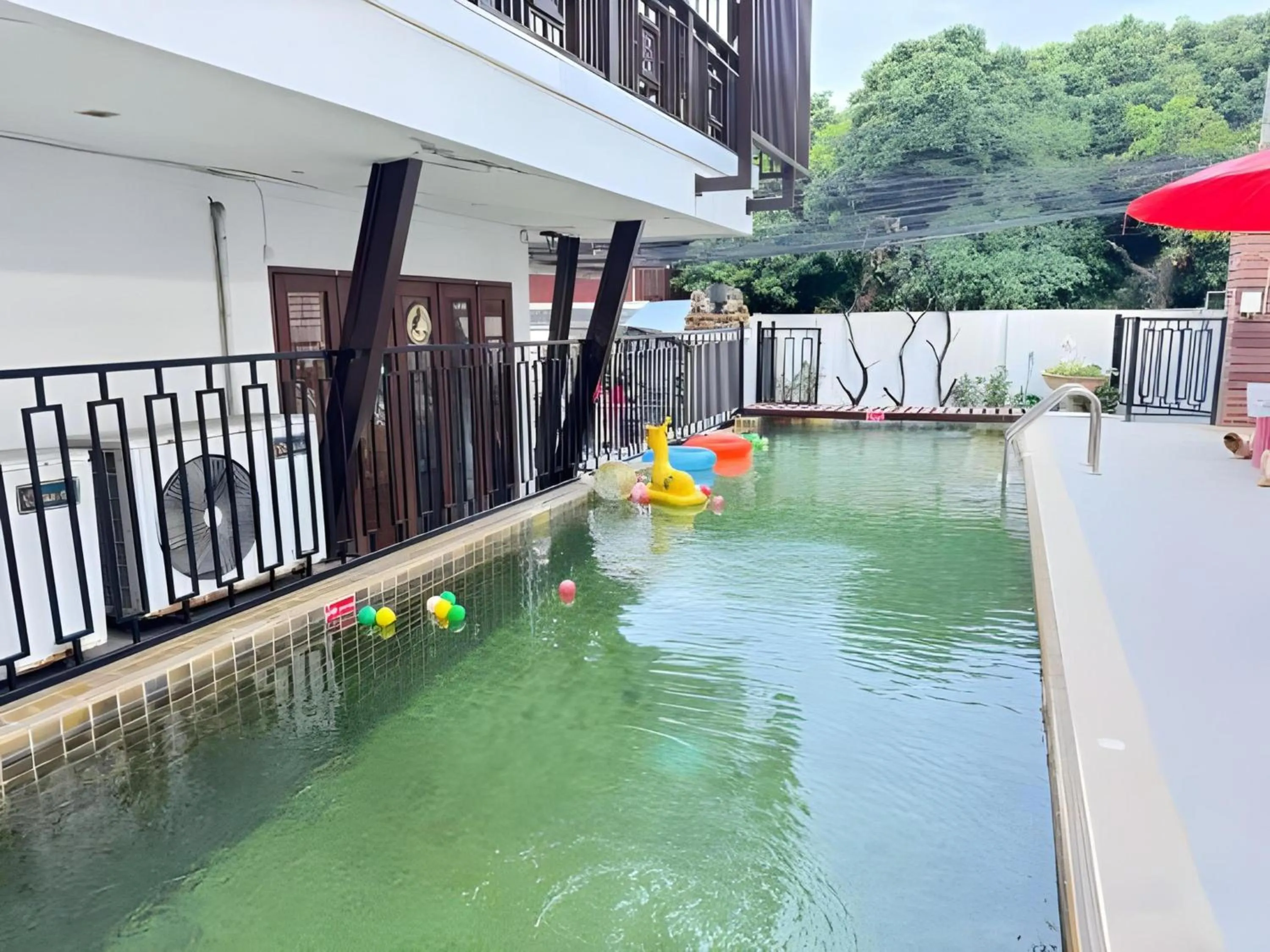 Swimming pool in Collection O Bupamontra Chiangmai