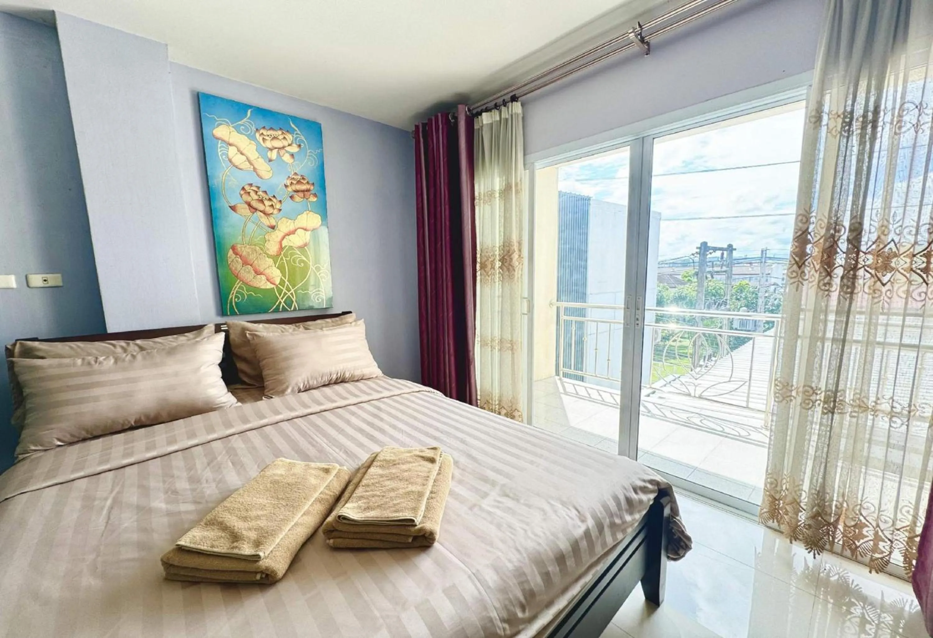 Photo of the whole room, Bed in Collection O Bupamontra Chiangmai