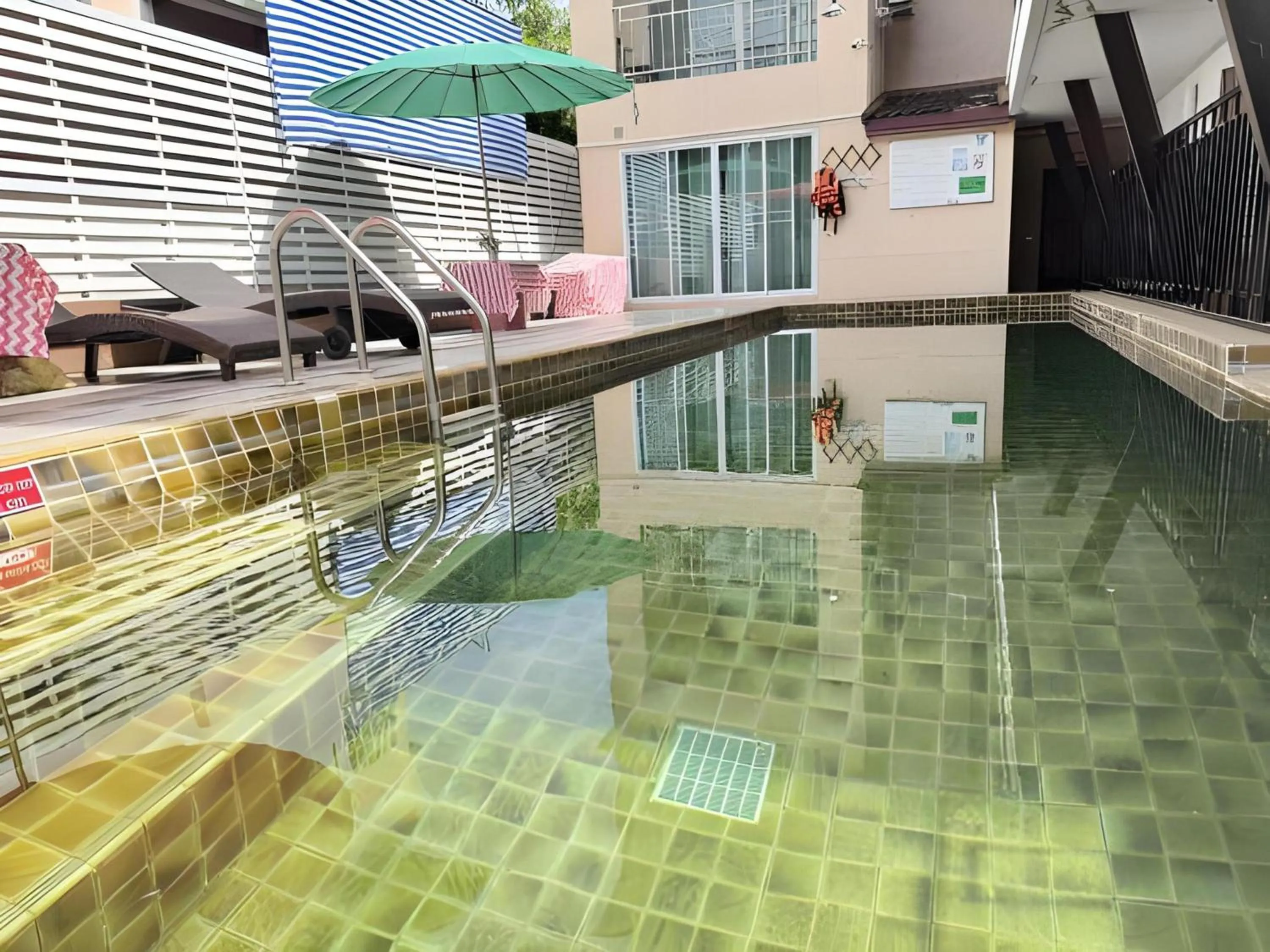 Swimming pool in Collection O Bupamontra Chiangmai