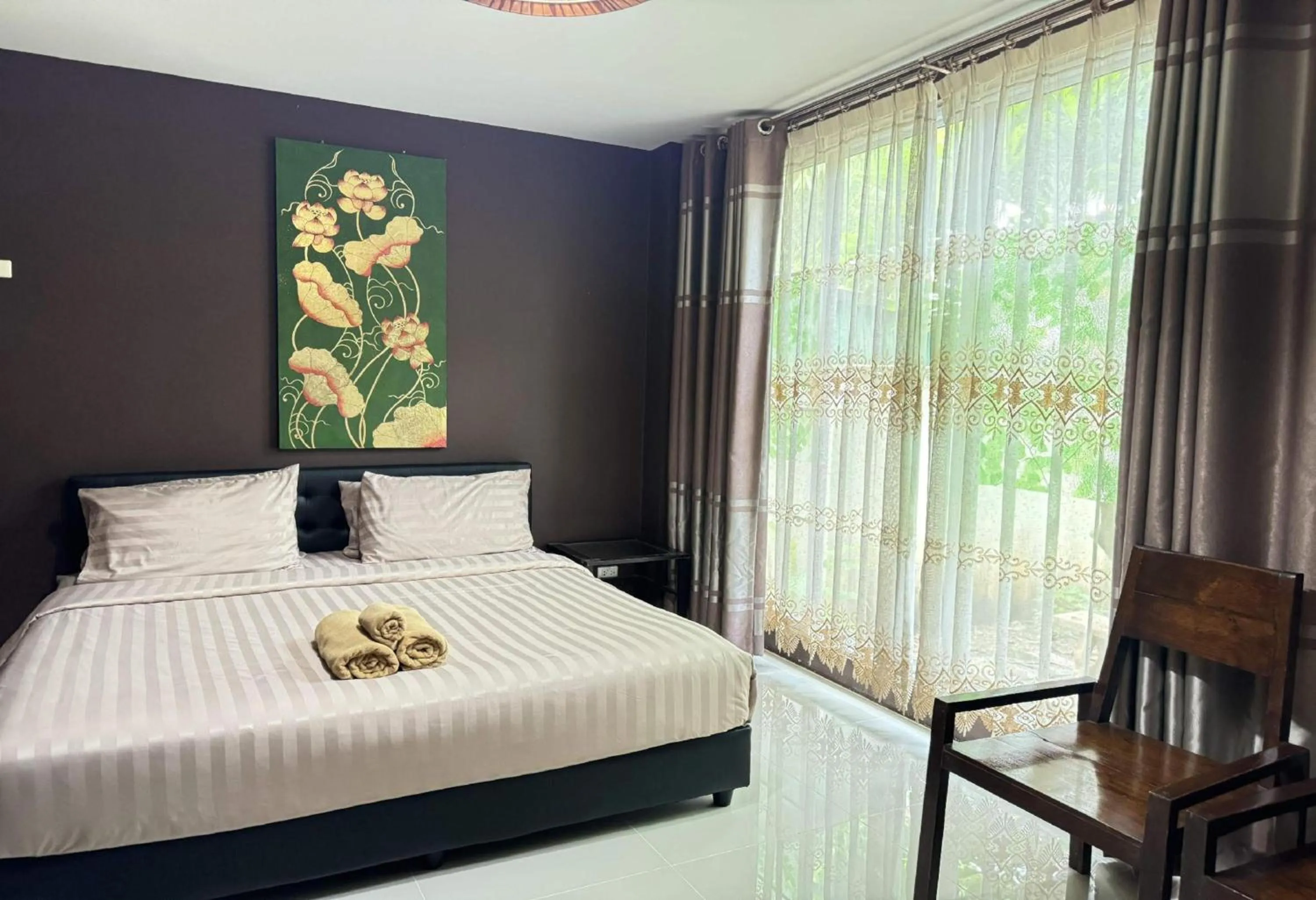 Photo of the whole room, Bed in Collection O Bupamontra Chiangmai