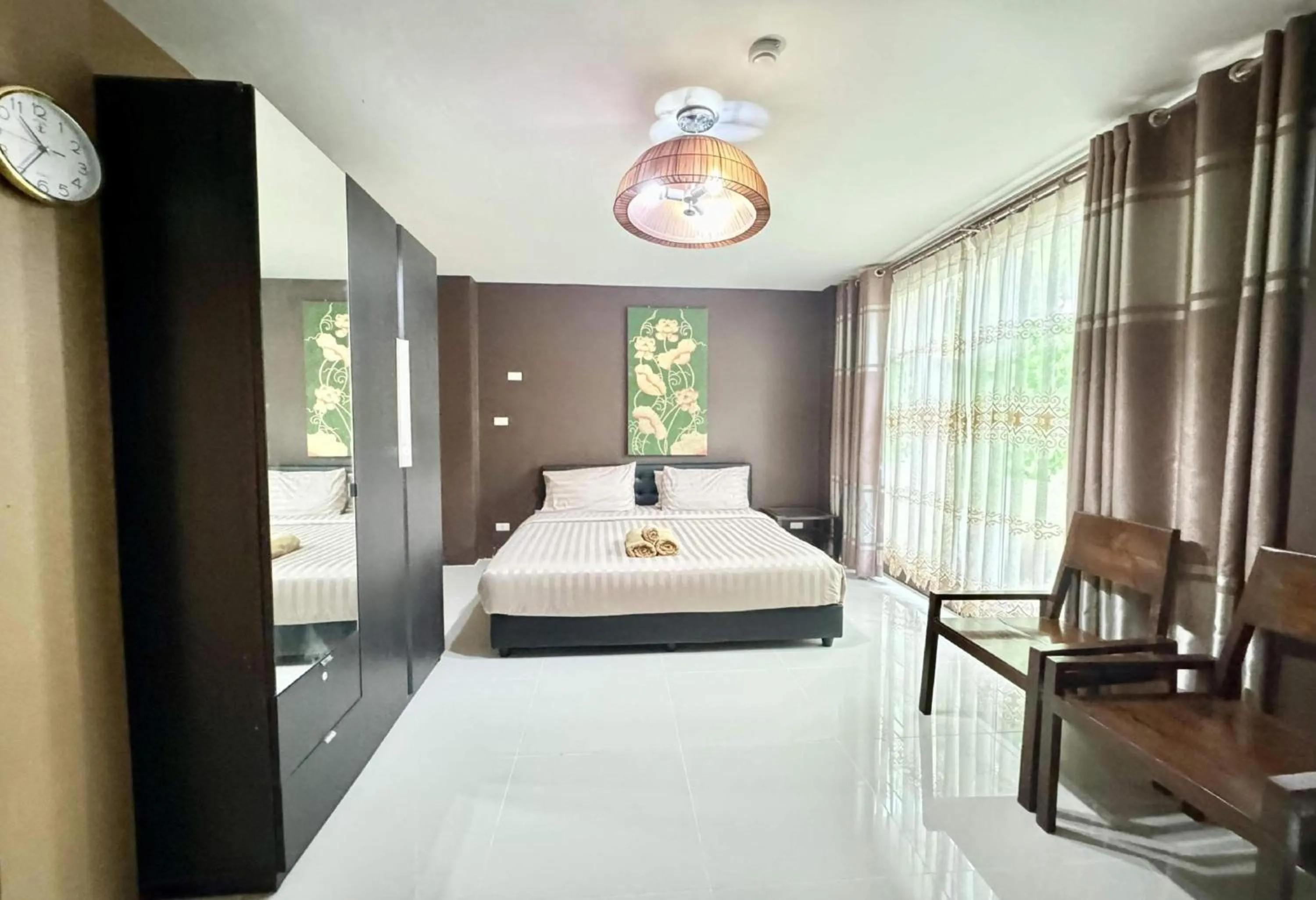 Photo of the whole room, Bed in Collection O Bupamontra Chiangmai