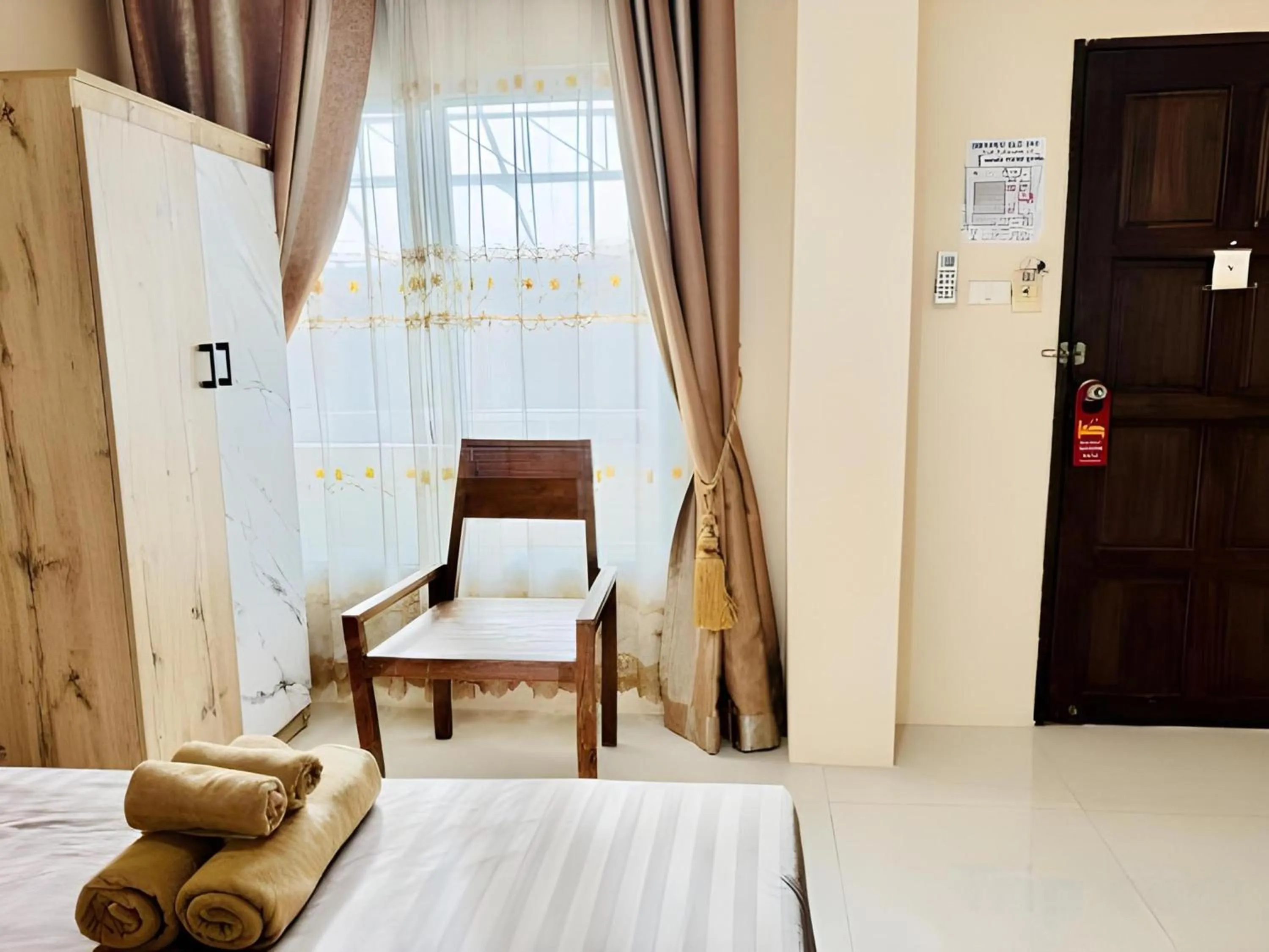 Photo of the whole room, Bed in Collection O Bupamontra Chiangmai