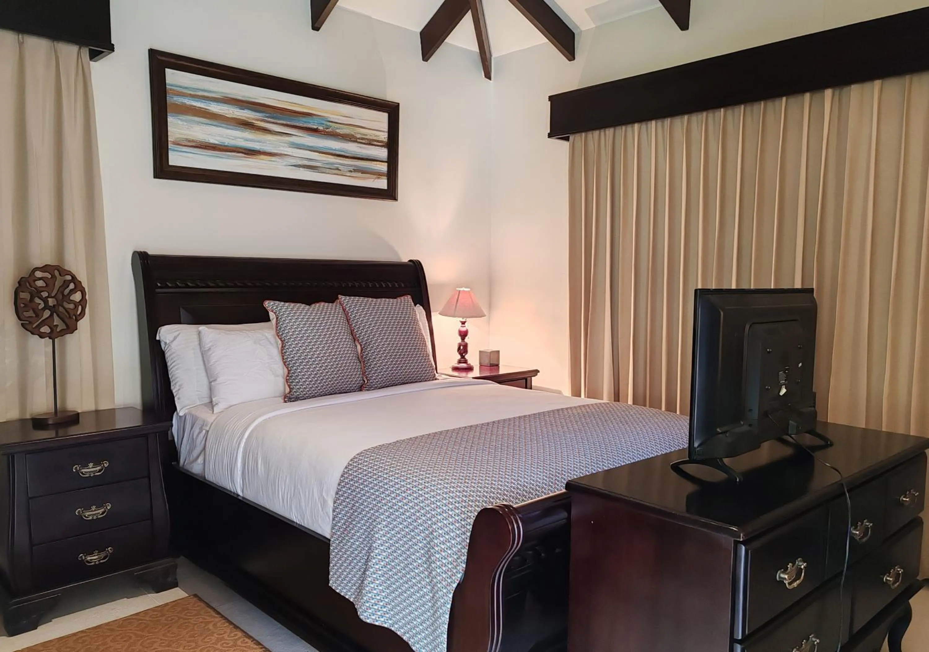 Bed in Marenaz Oceanfront Resort