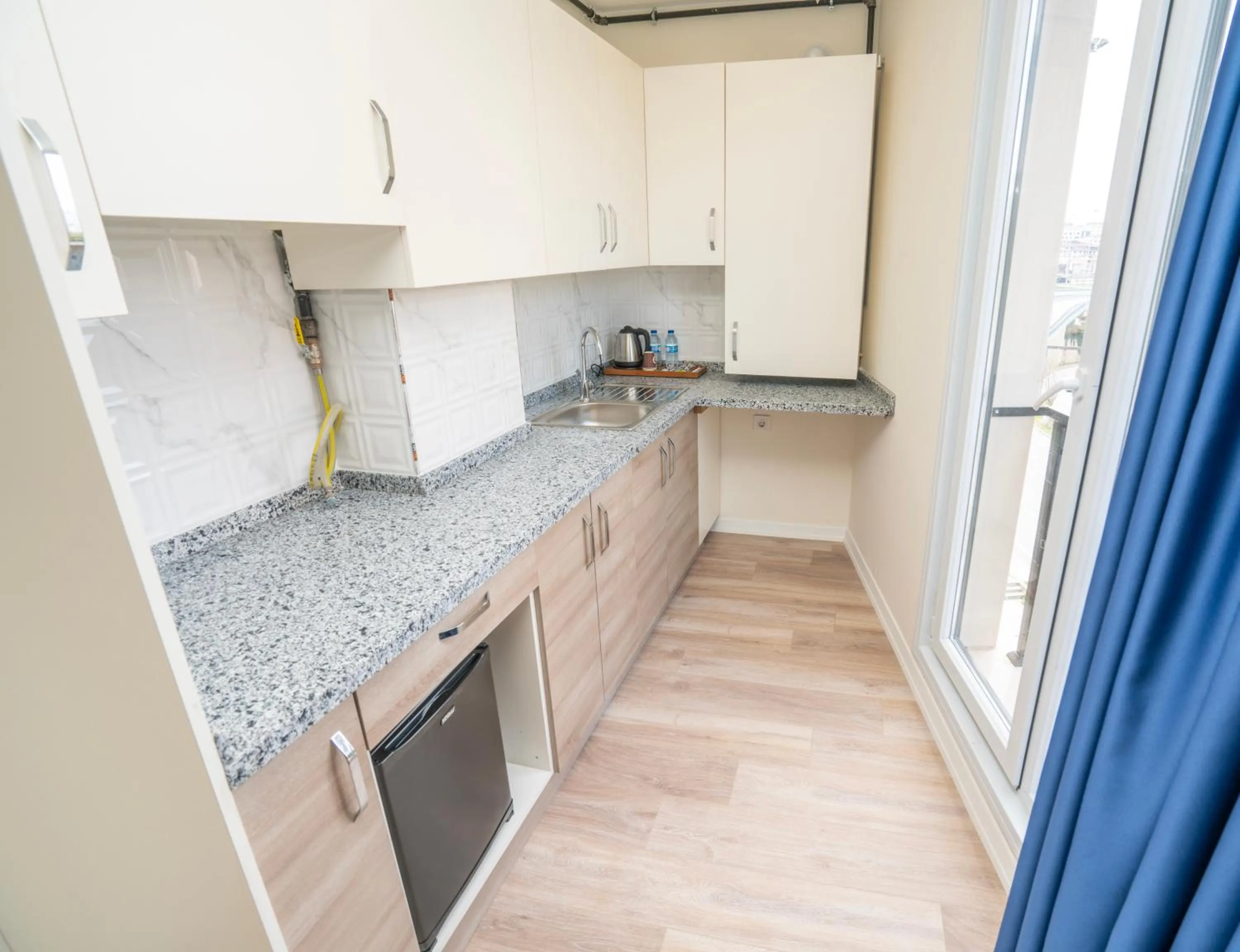 Kitchen or kitchenette in Guest Suites