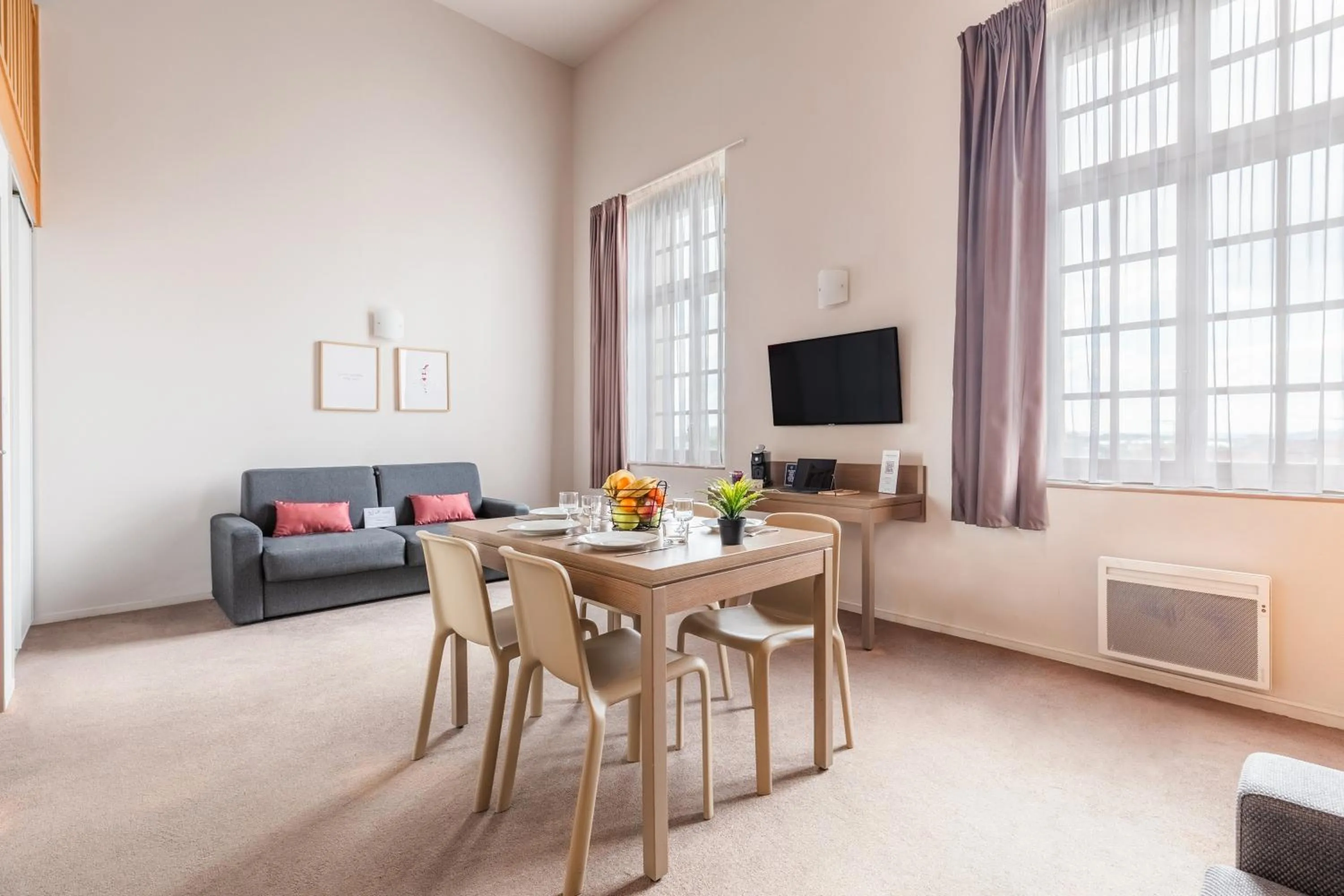 Living room in Appart’City Confort Reims Centre