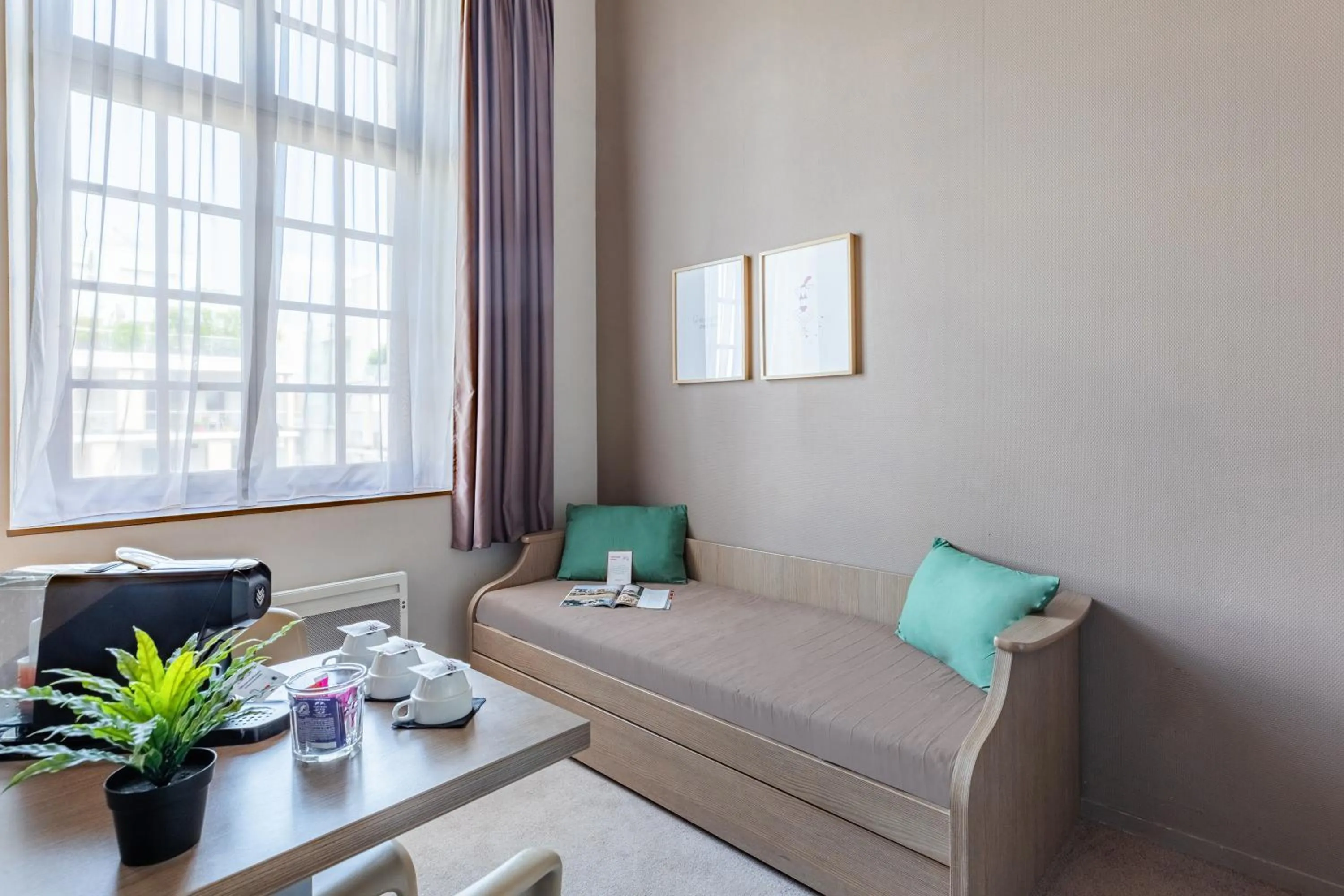 Living room in Appart’City Confort Reims Centre