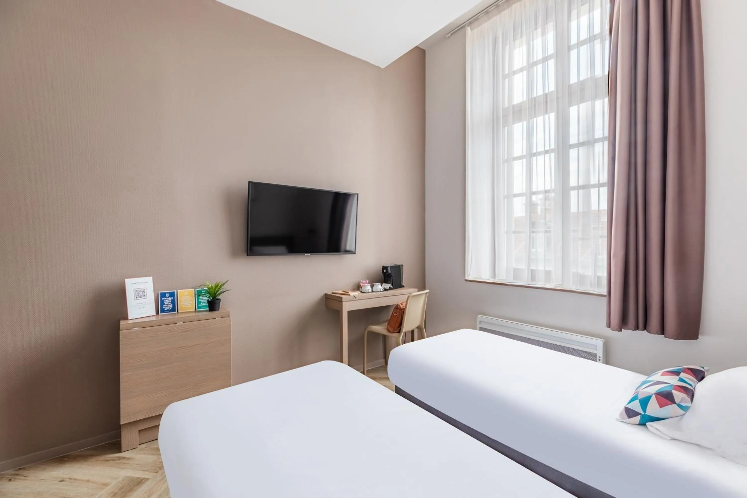 Bedroom, Bed in Appart’City Confort Reims Centre