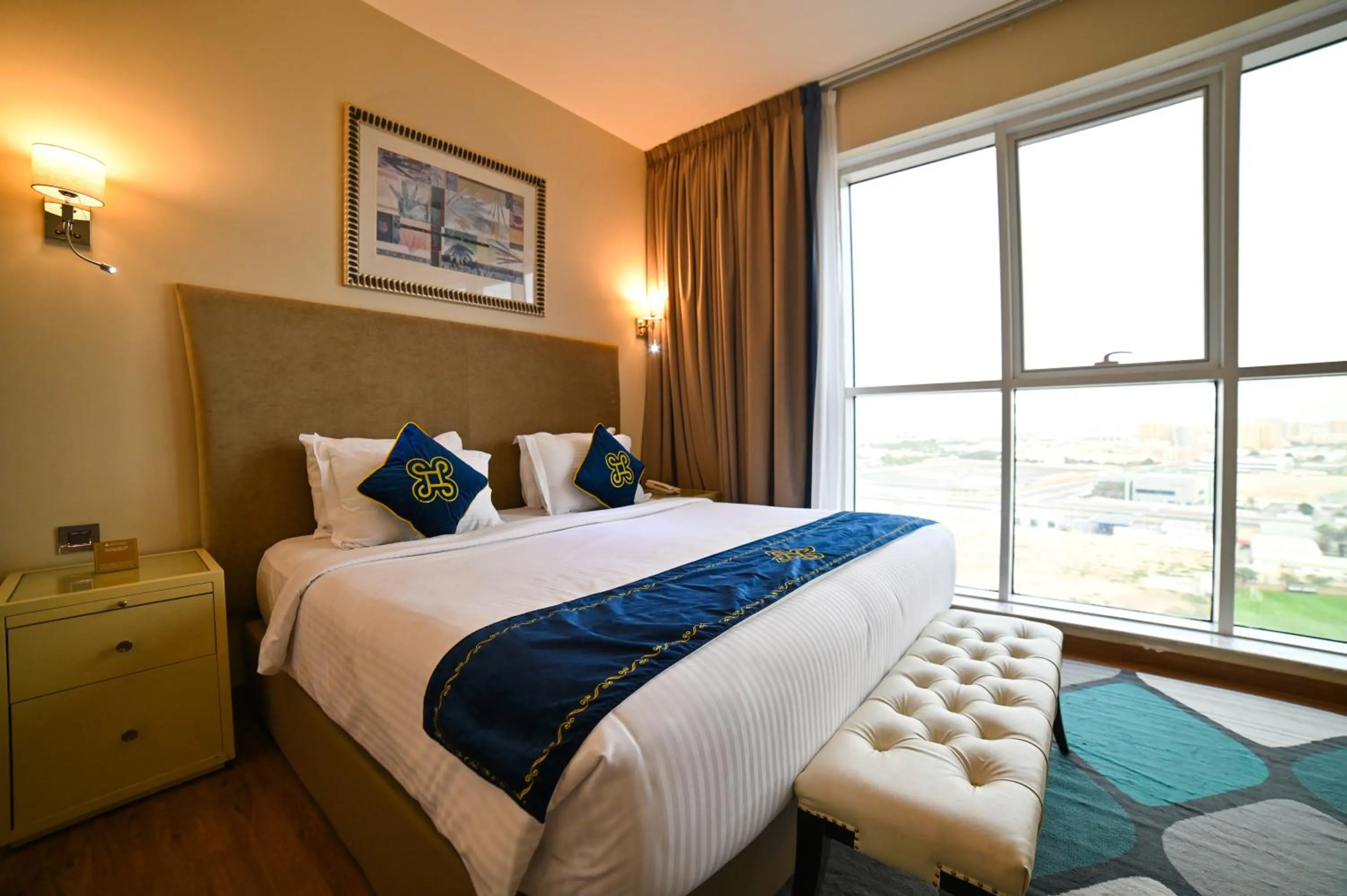 Bed in Seven Seas Hotel