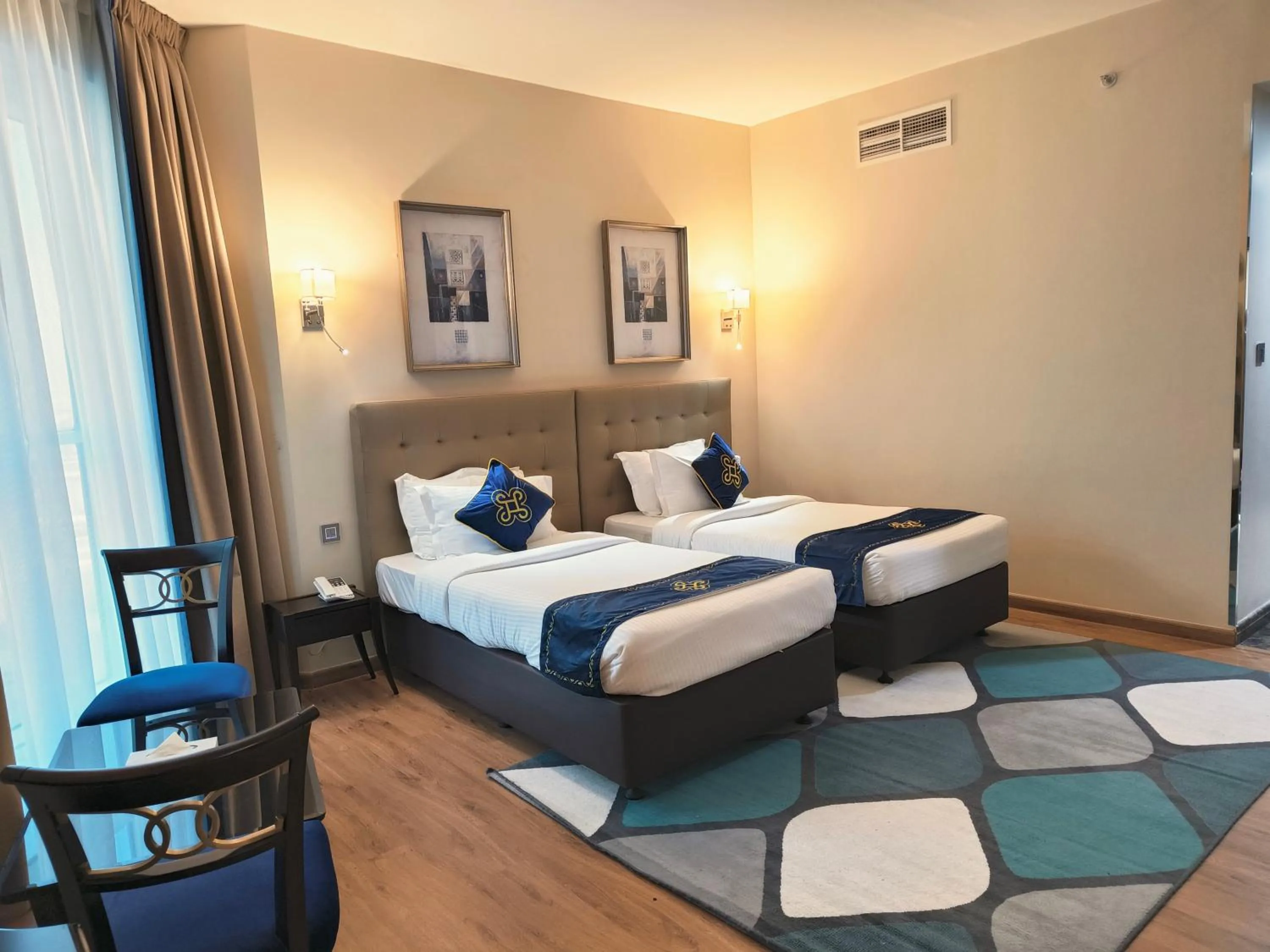 Bed in Seven Seas Hotel