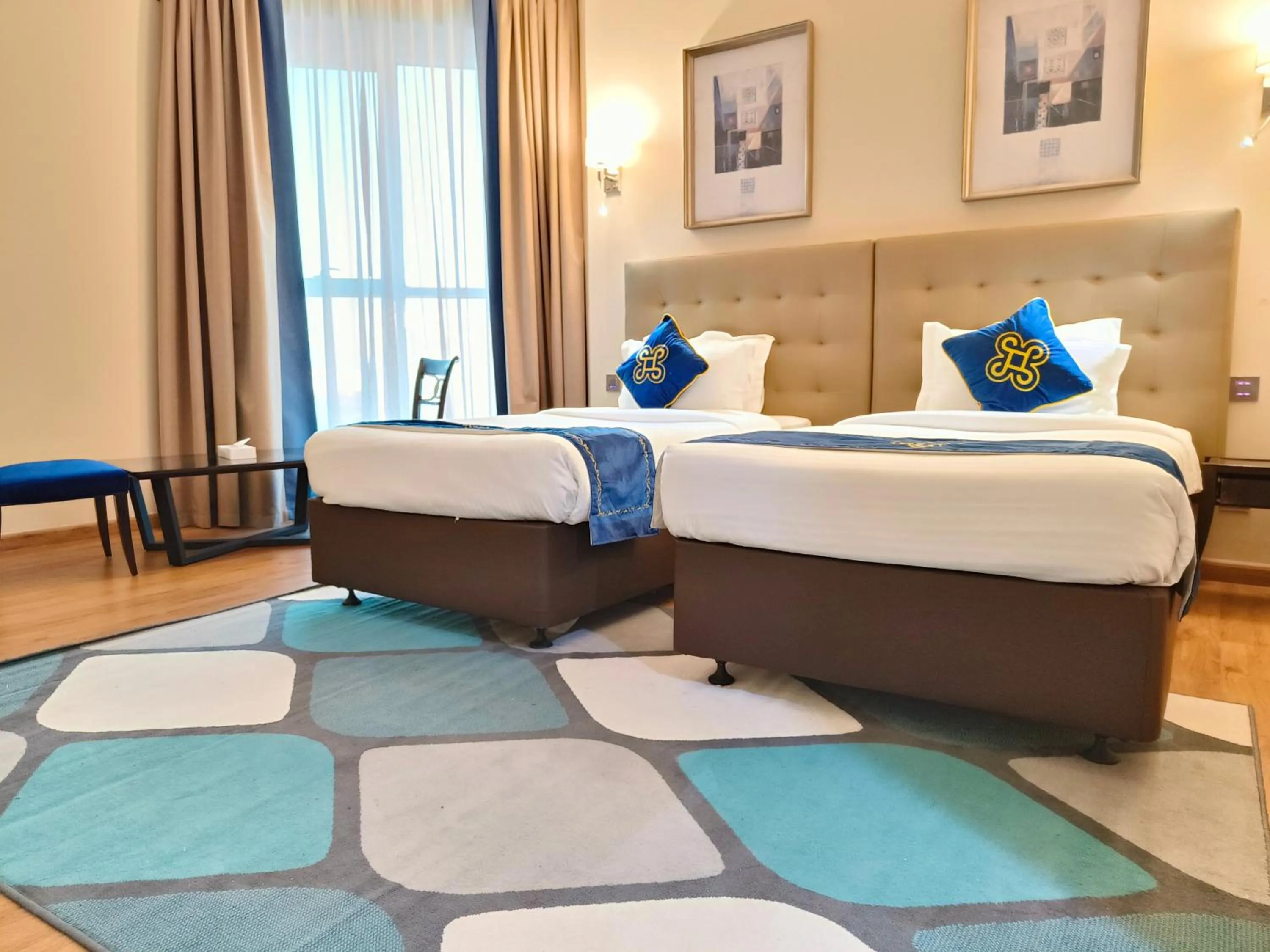 Bed in Seven Seas Hotel