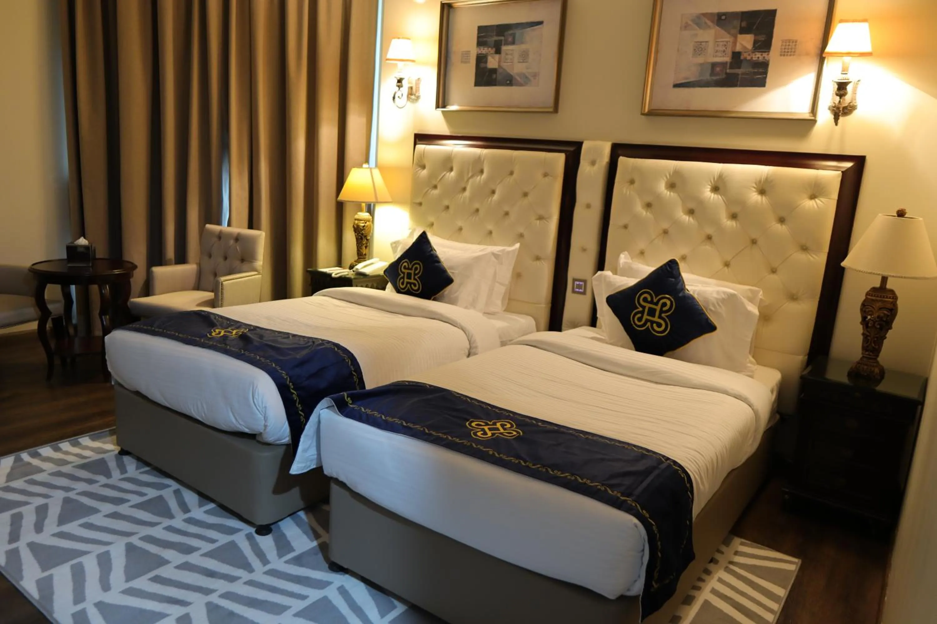Bed in Seven Seas Hotel