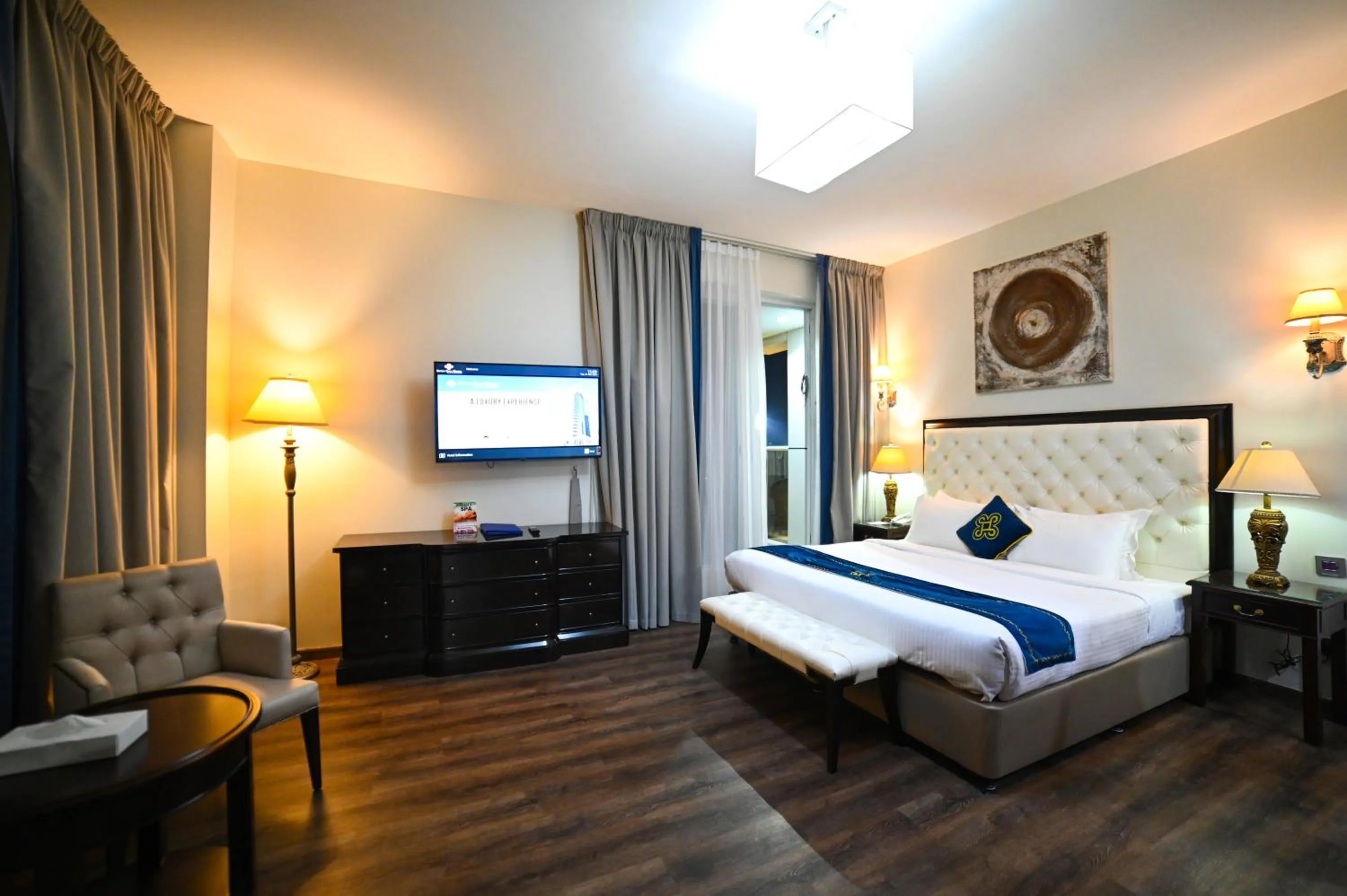 Bed in Seven Seas Hotel