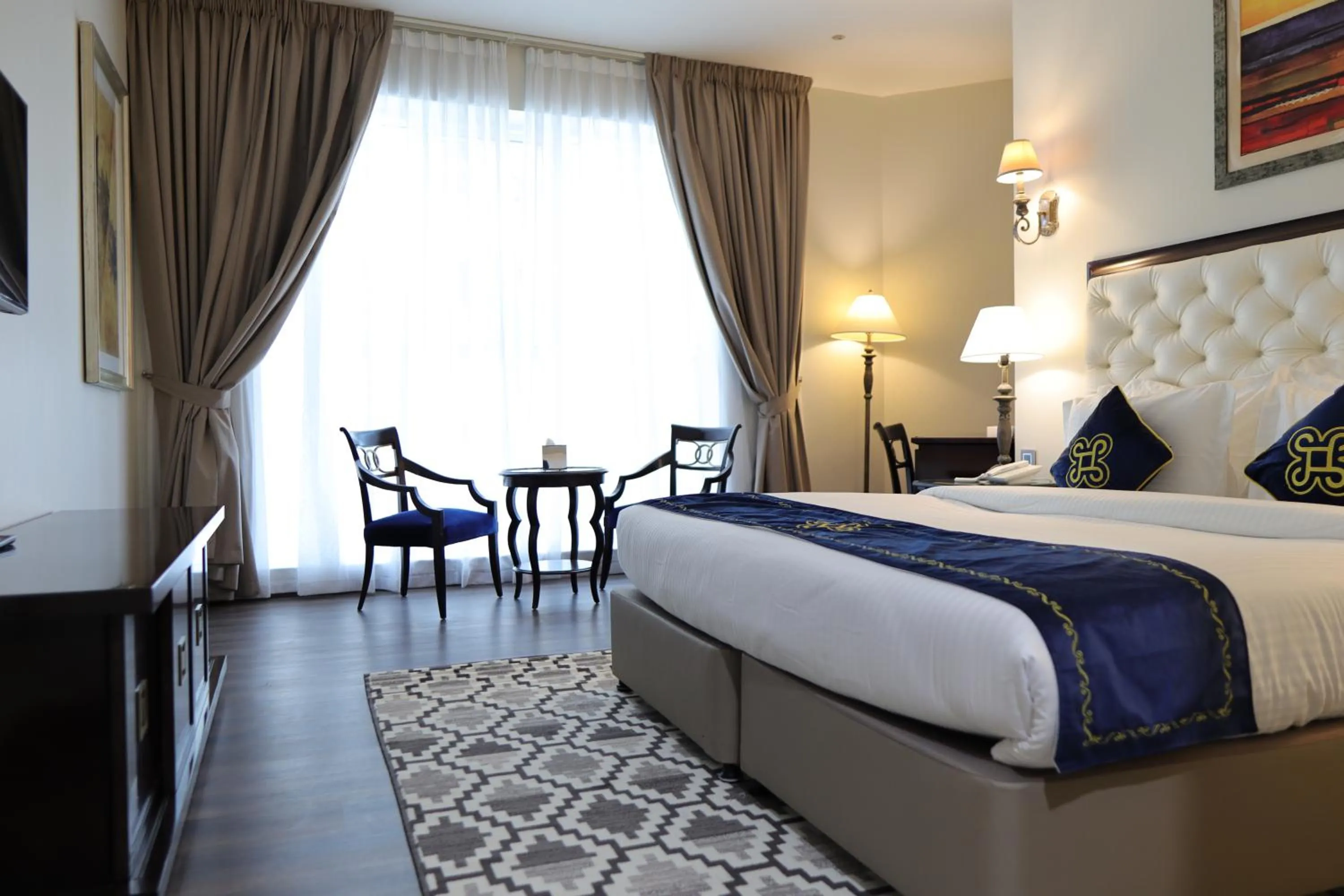 Bed in Seven Seas Hotel