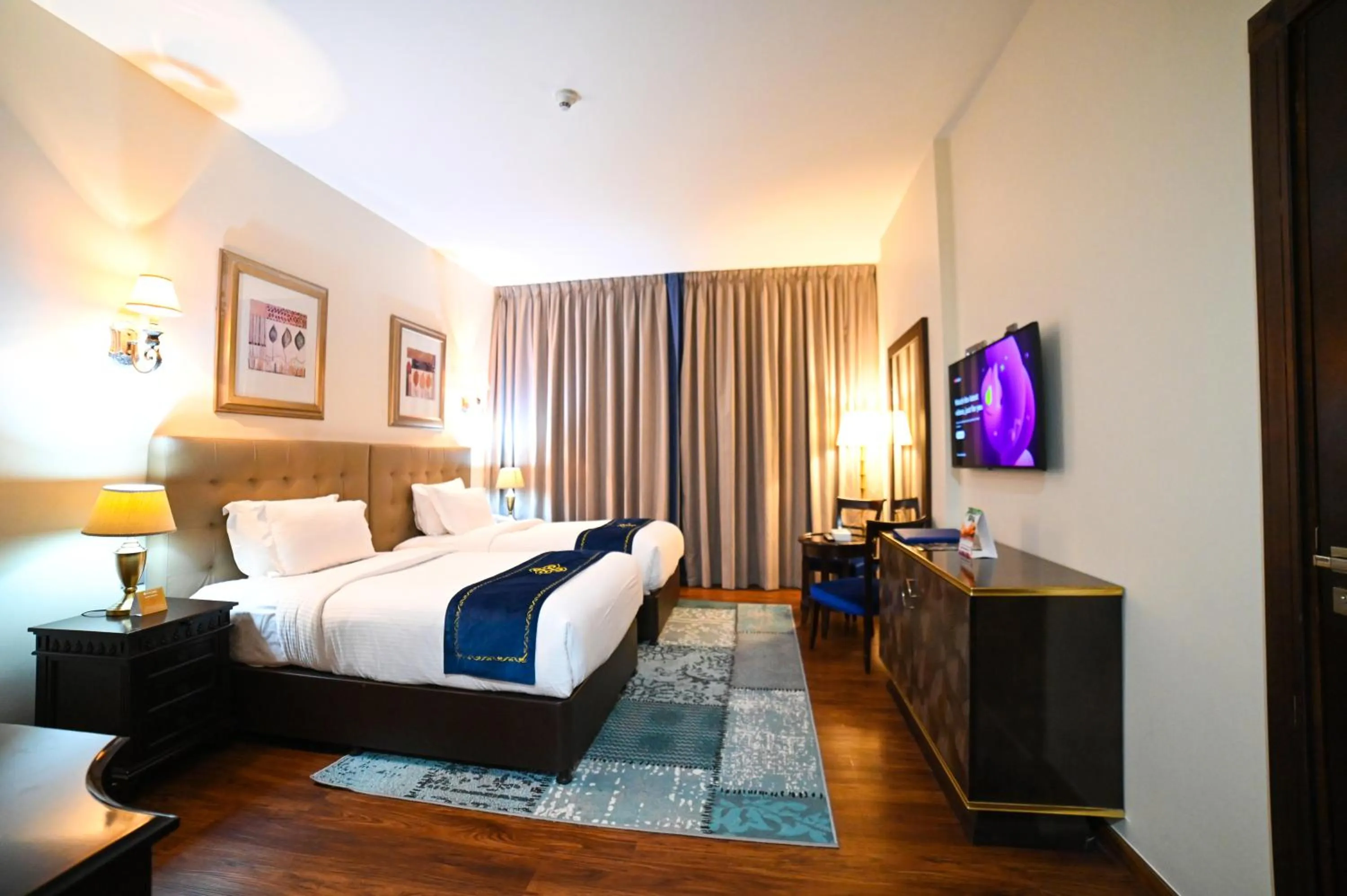 Bed in Seven Seas Hotel