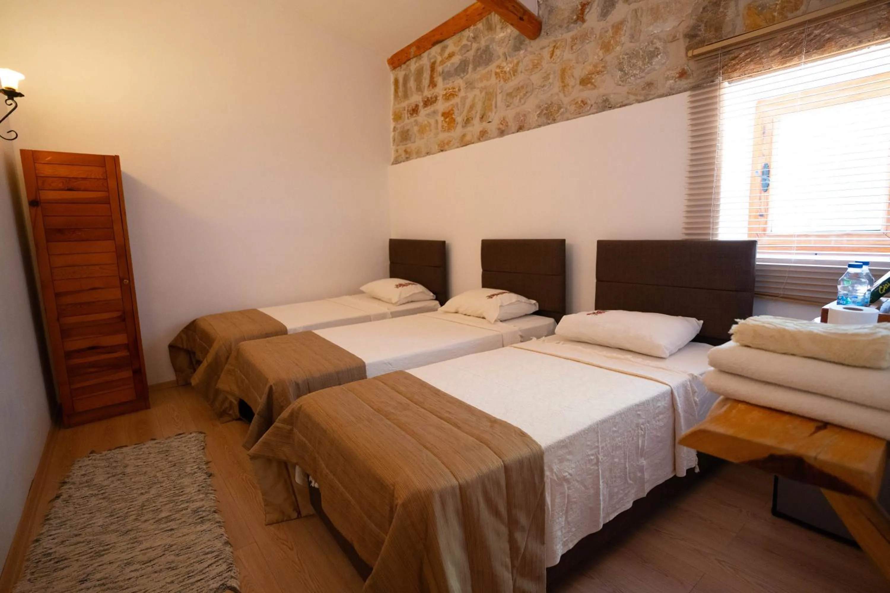 Bed in Mogla Tashan Hotel