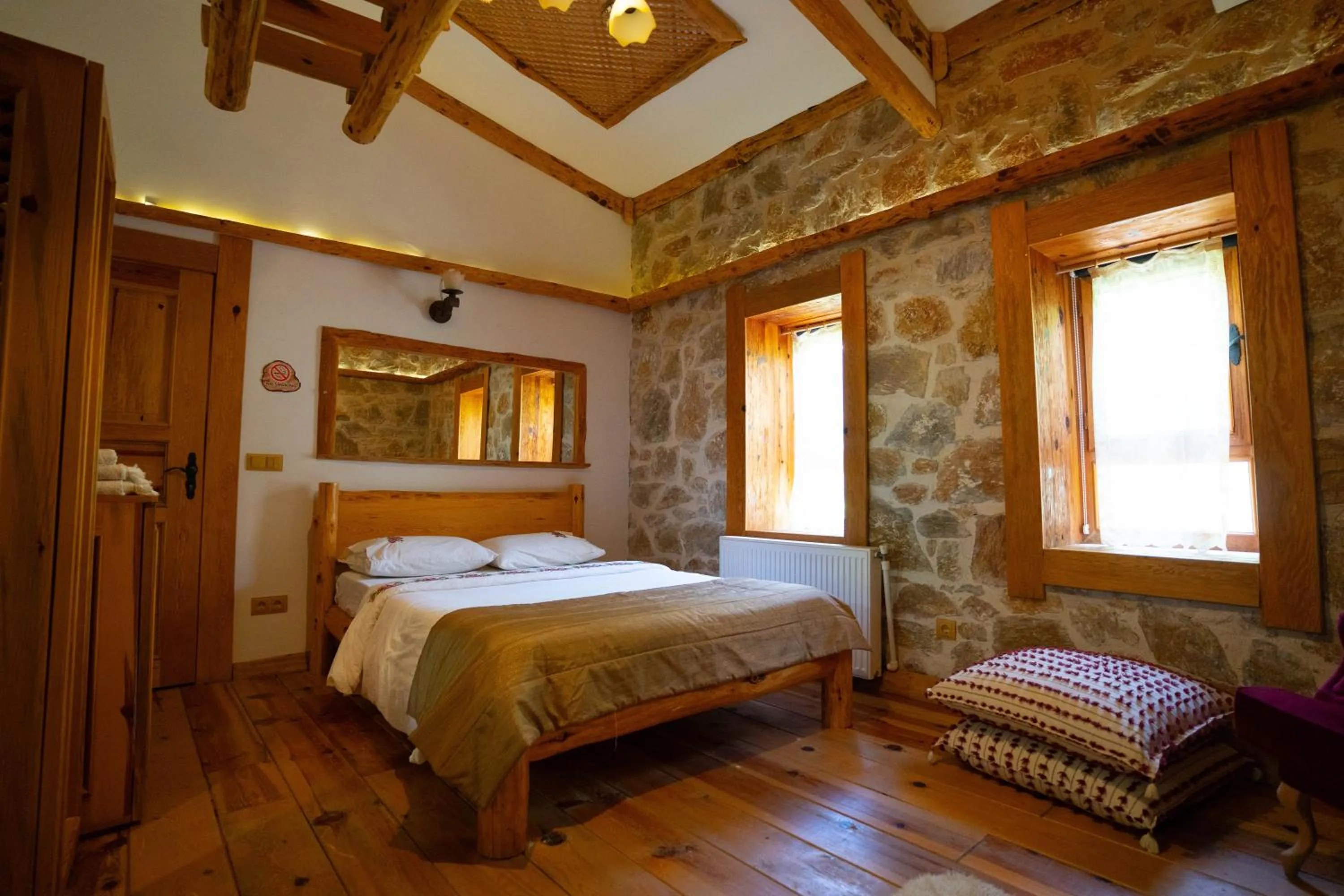 Bed in Mogla Tashan Hotel