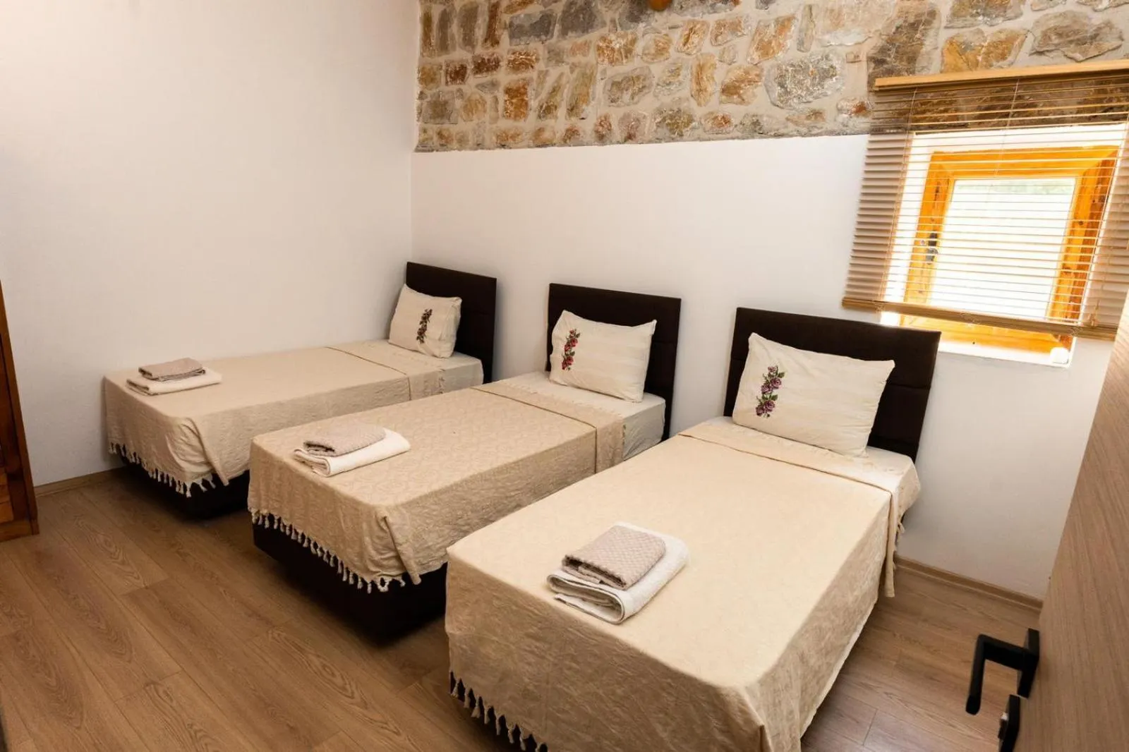 Bed in Mogla Tashan Hotel