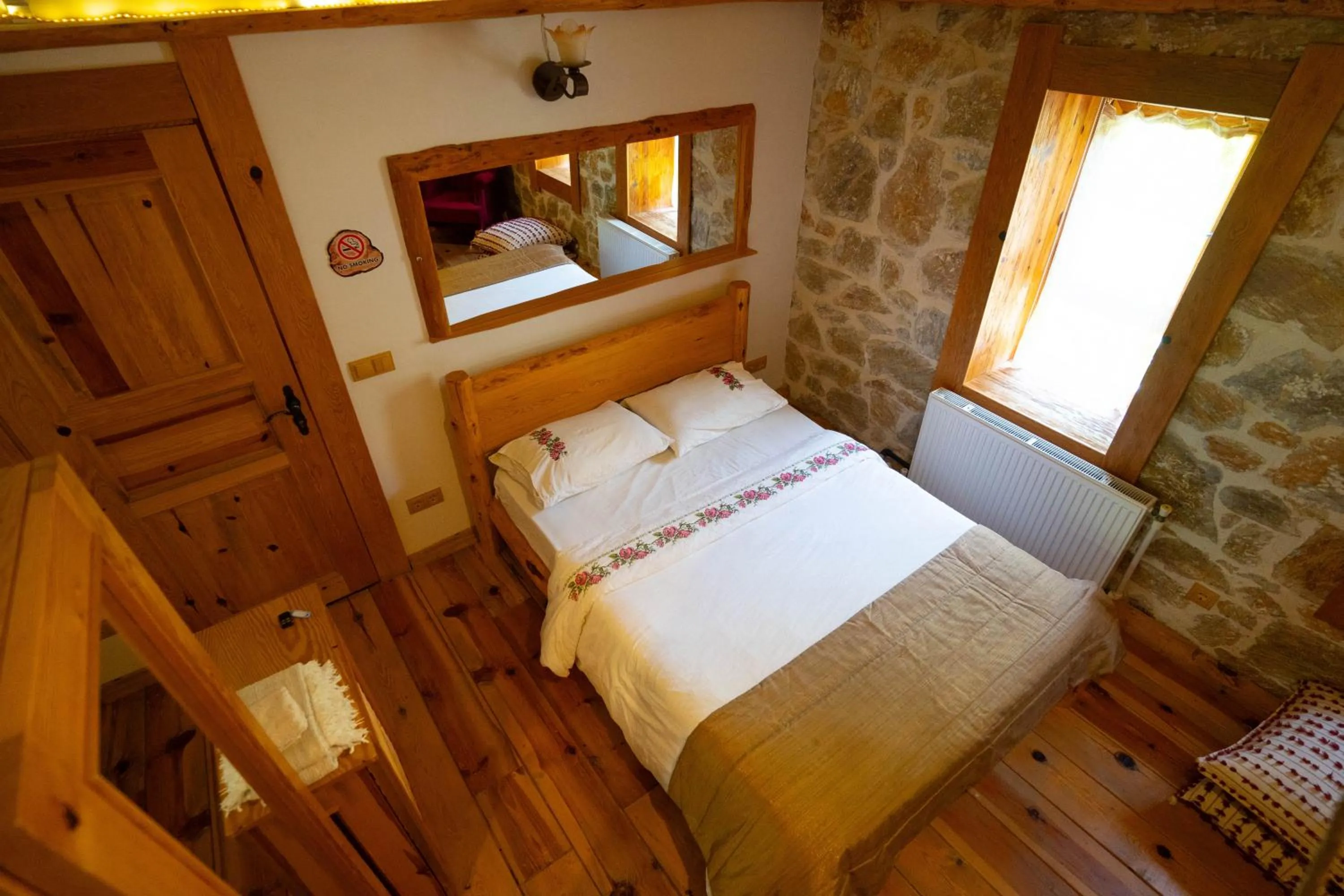 Bed in Mogla Tashan Hotel