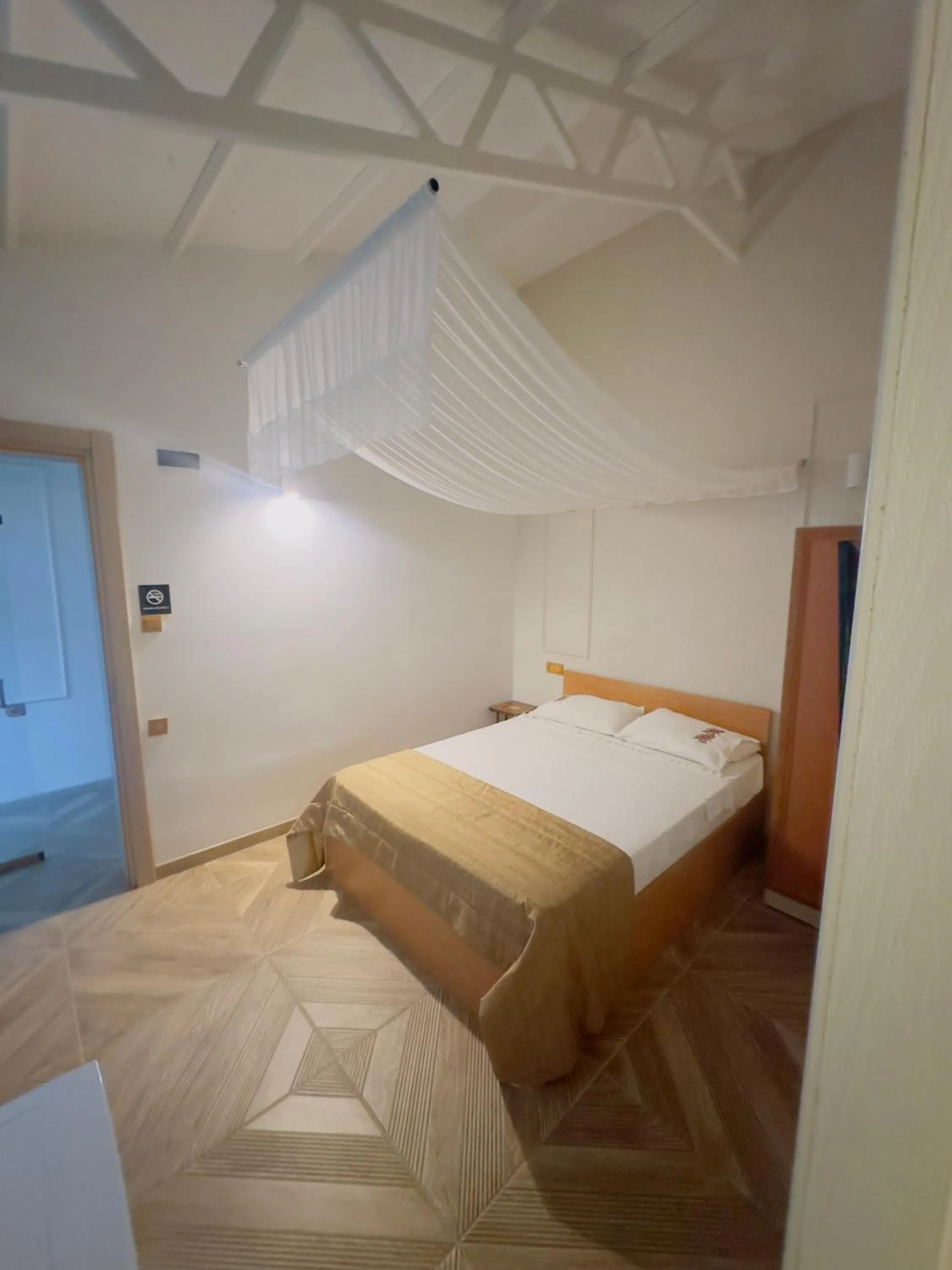 Bed in Mogla Tashan Hotel