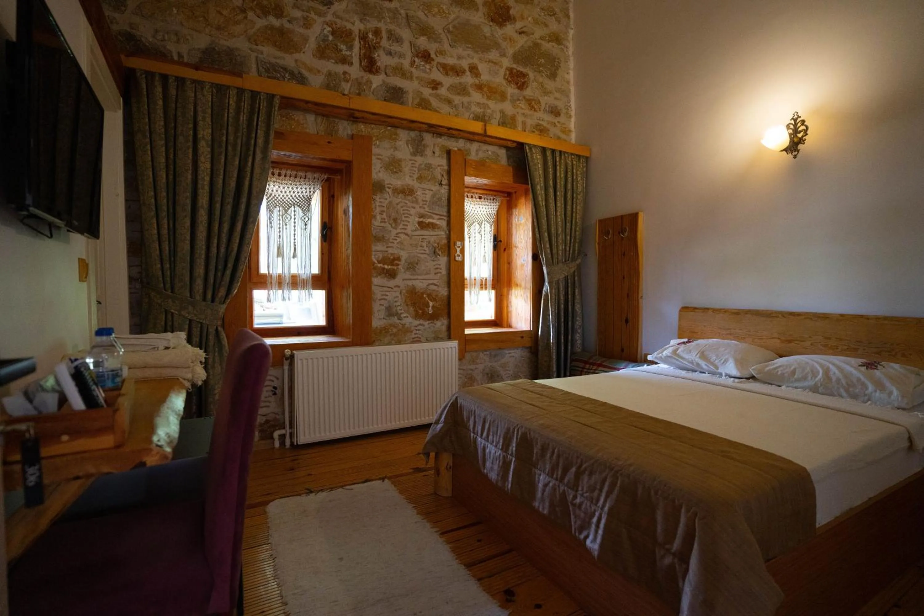 Bed in Mogla Tashan Hotel