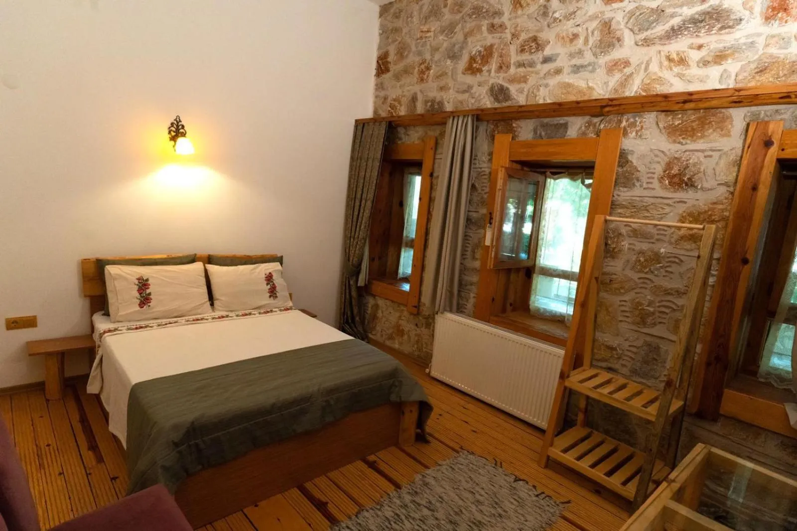 Bed in Mogla Tashan Hotel