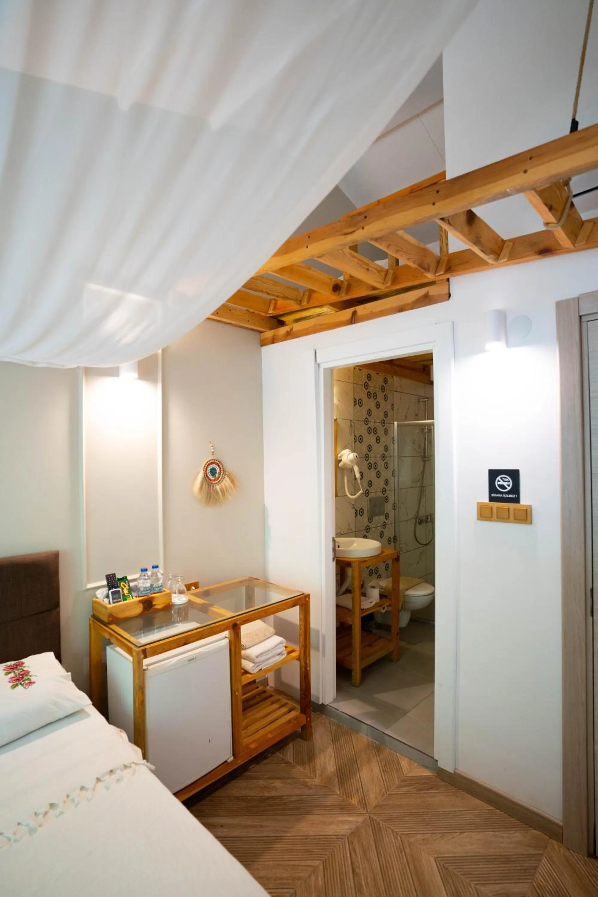 Bed in Mogla Tashan Hotel