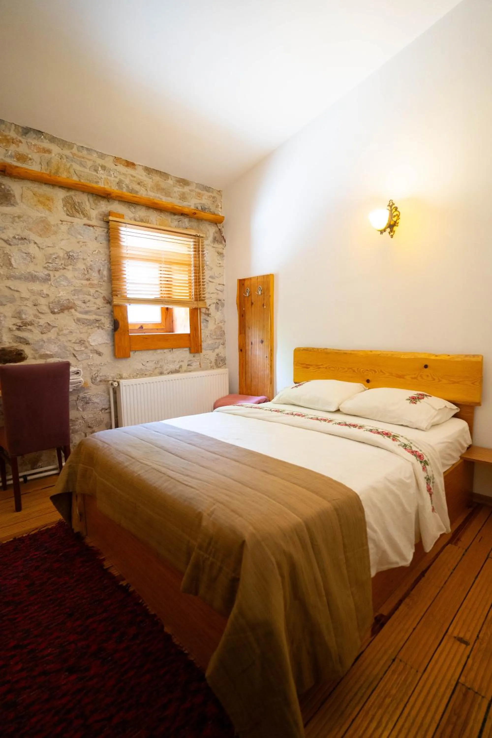 Bed in Mogla Tashan Hotel