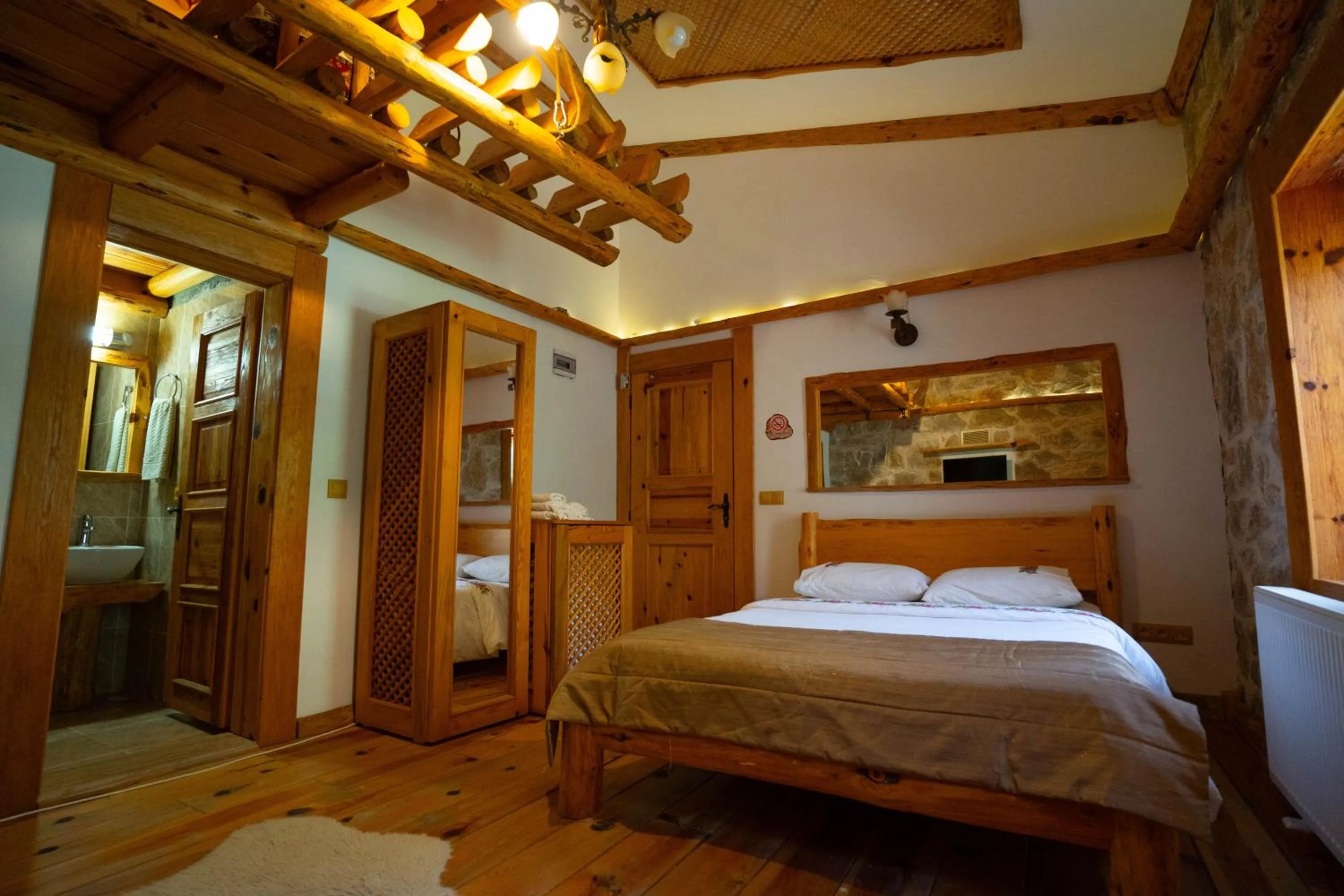 Bed in Mogla Tashan Hotel