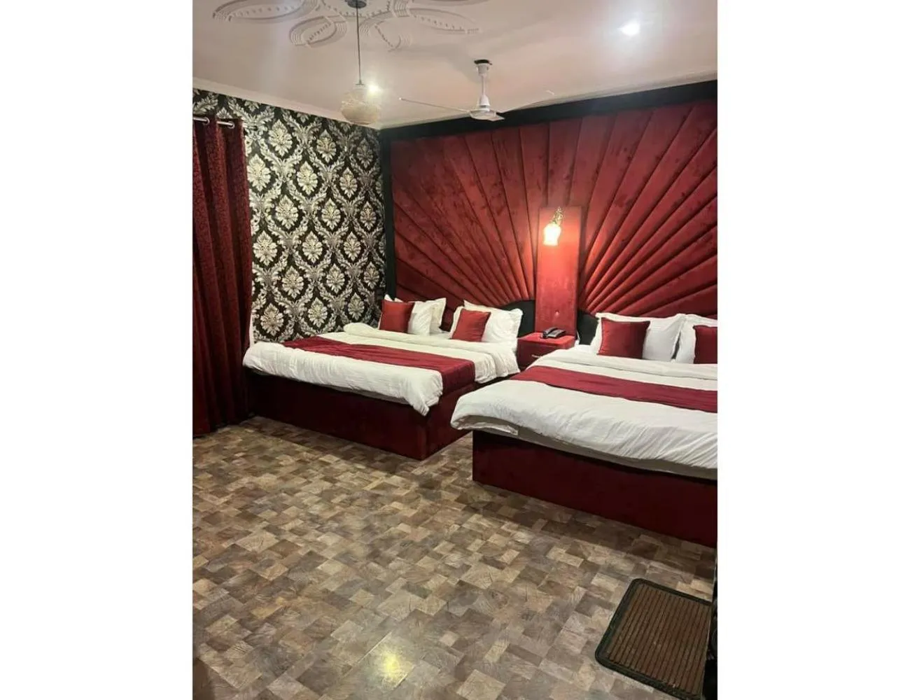 Bed in HOTEL ROOMA Srinagar