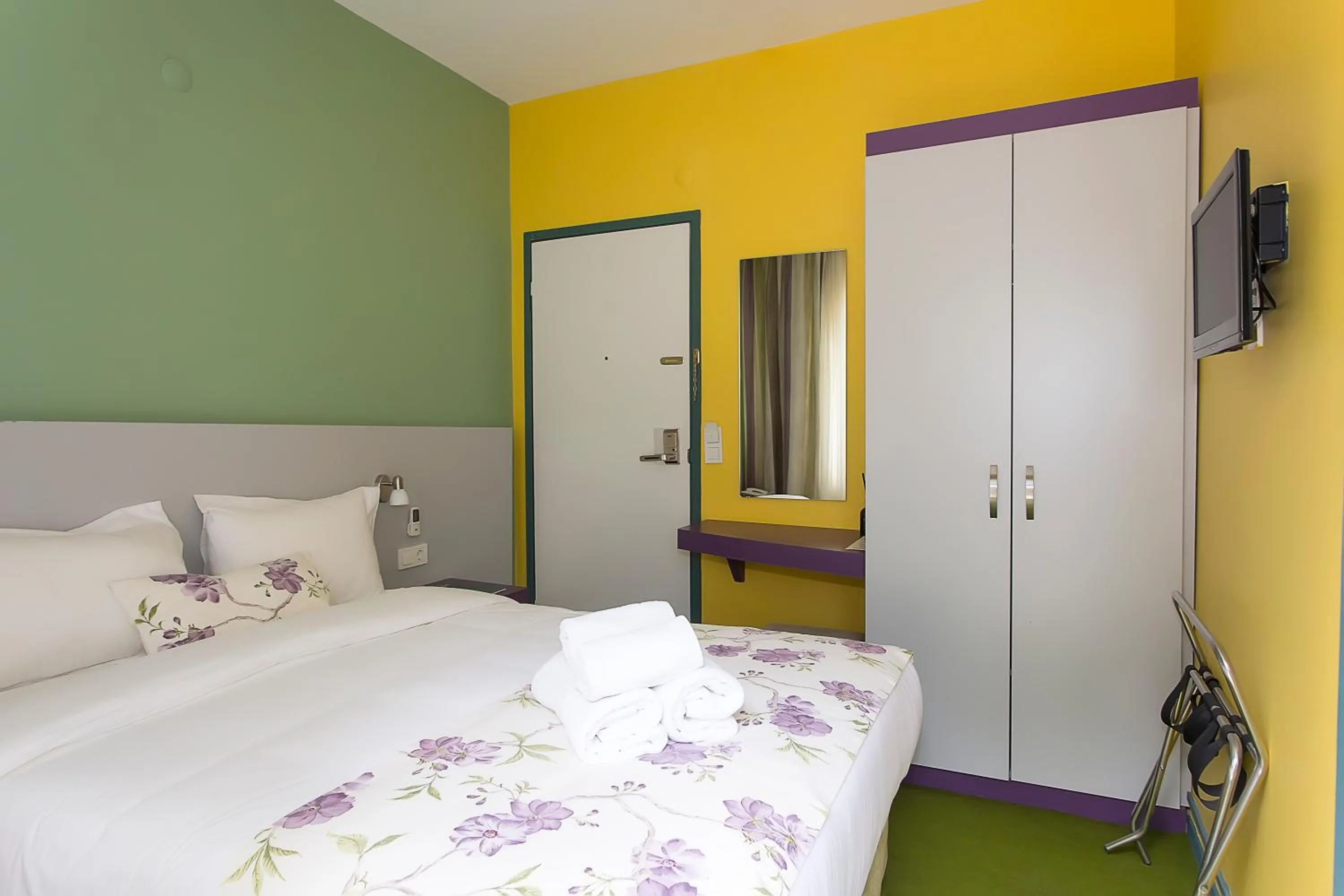 Bed in Mini Harem Hotel