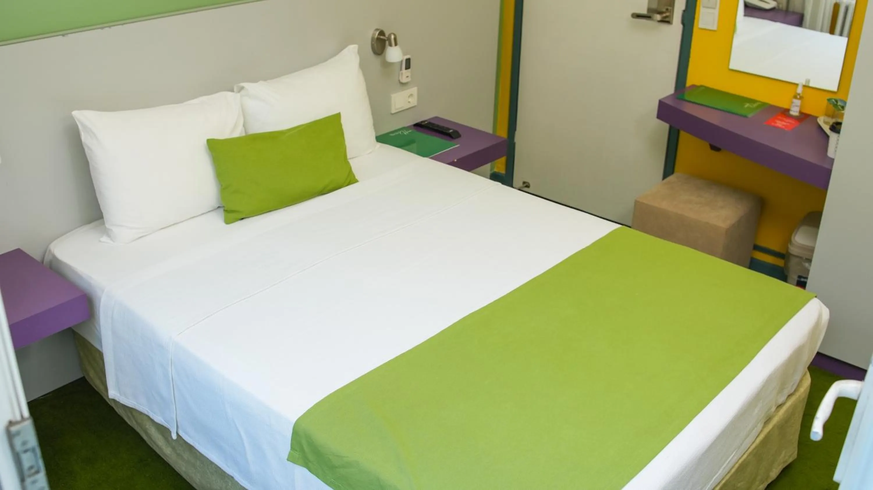 Bed in Mini Harem Hotel