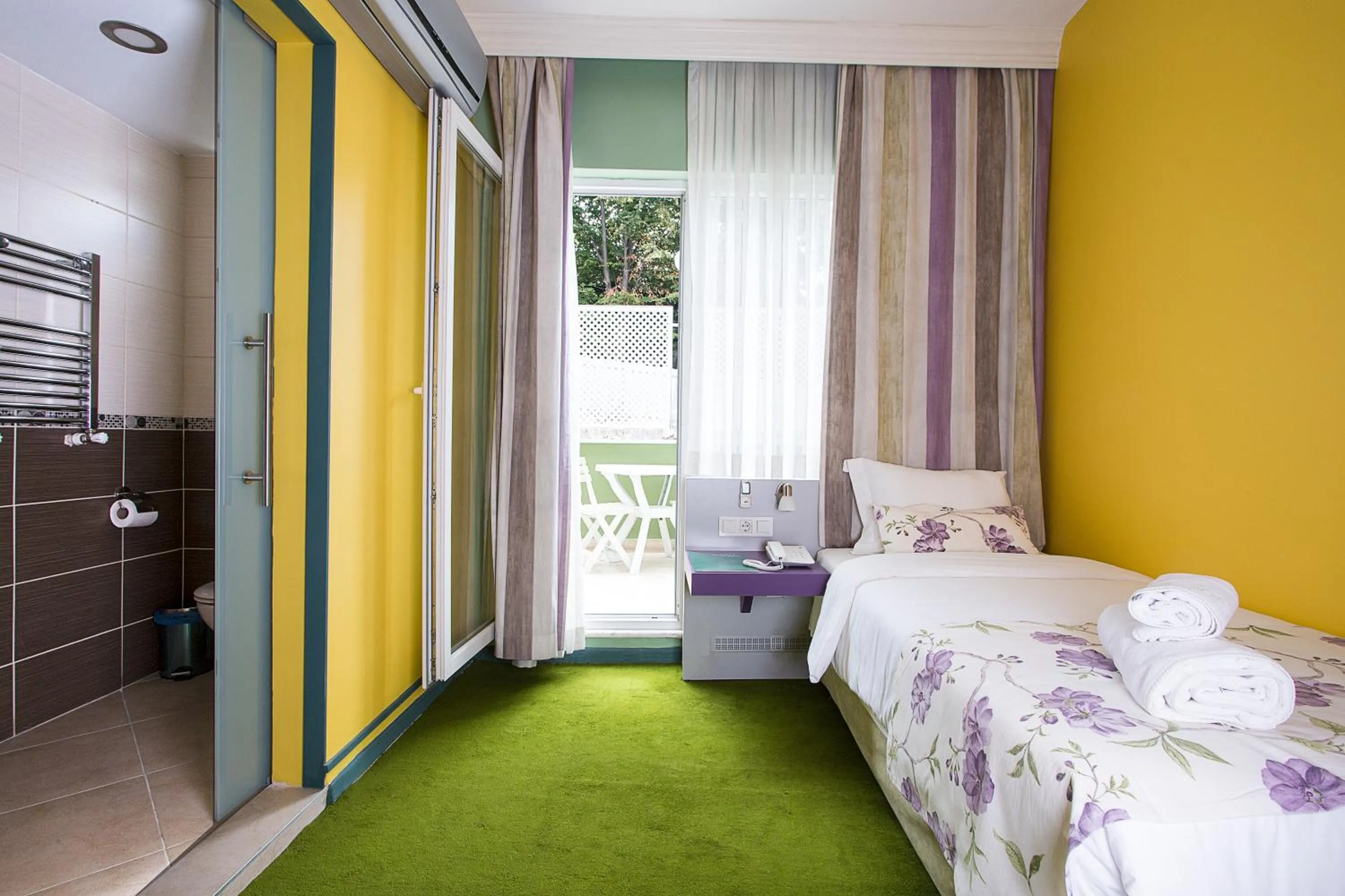 Bed in Mini Harem Hotel