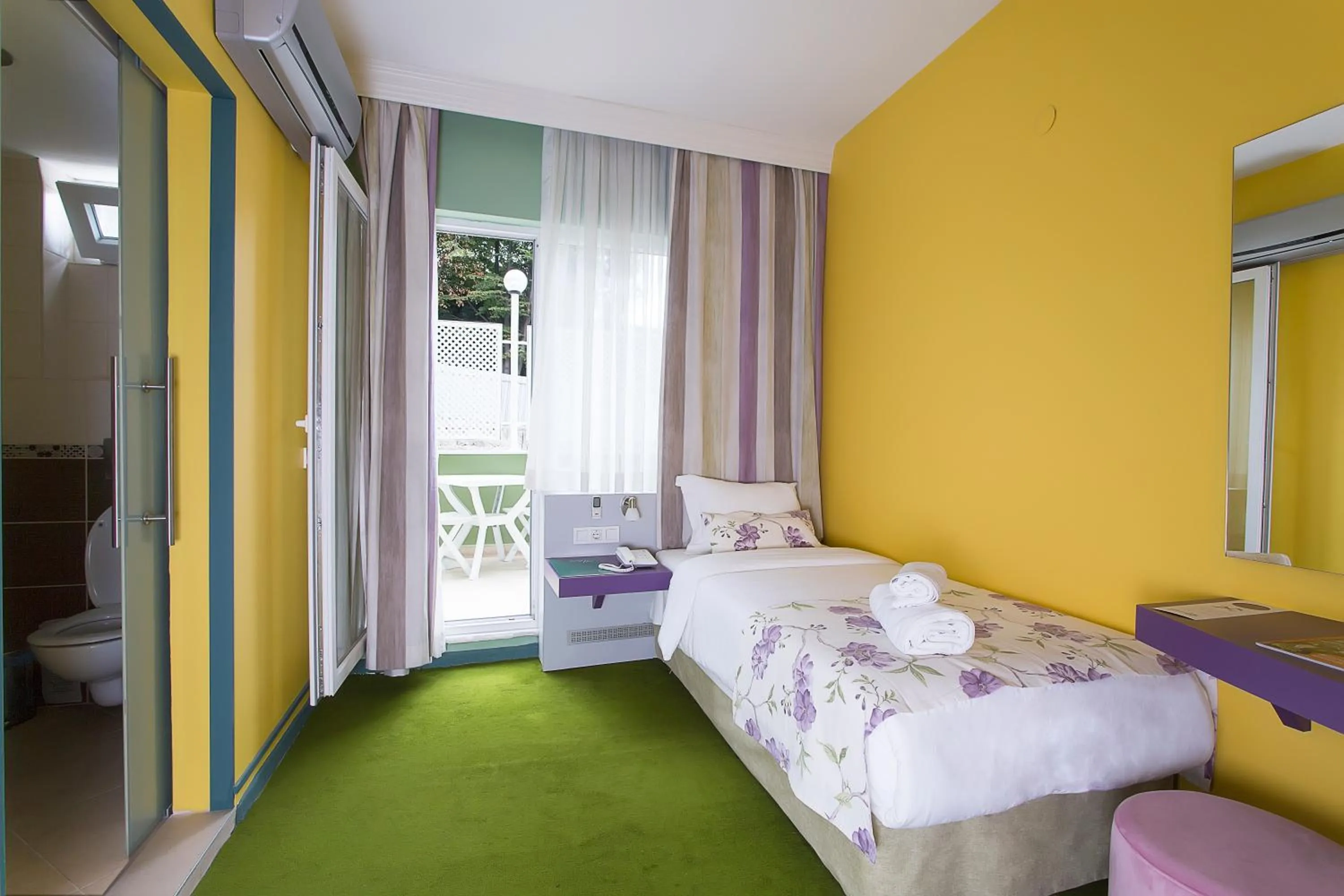 Bed in Mini Harem Hotel