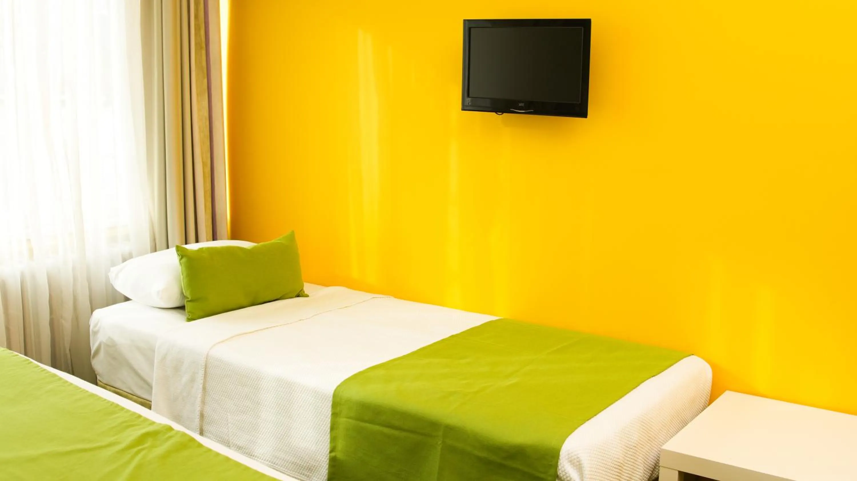 Bed in Mini Harem Hotel