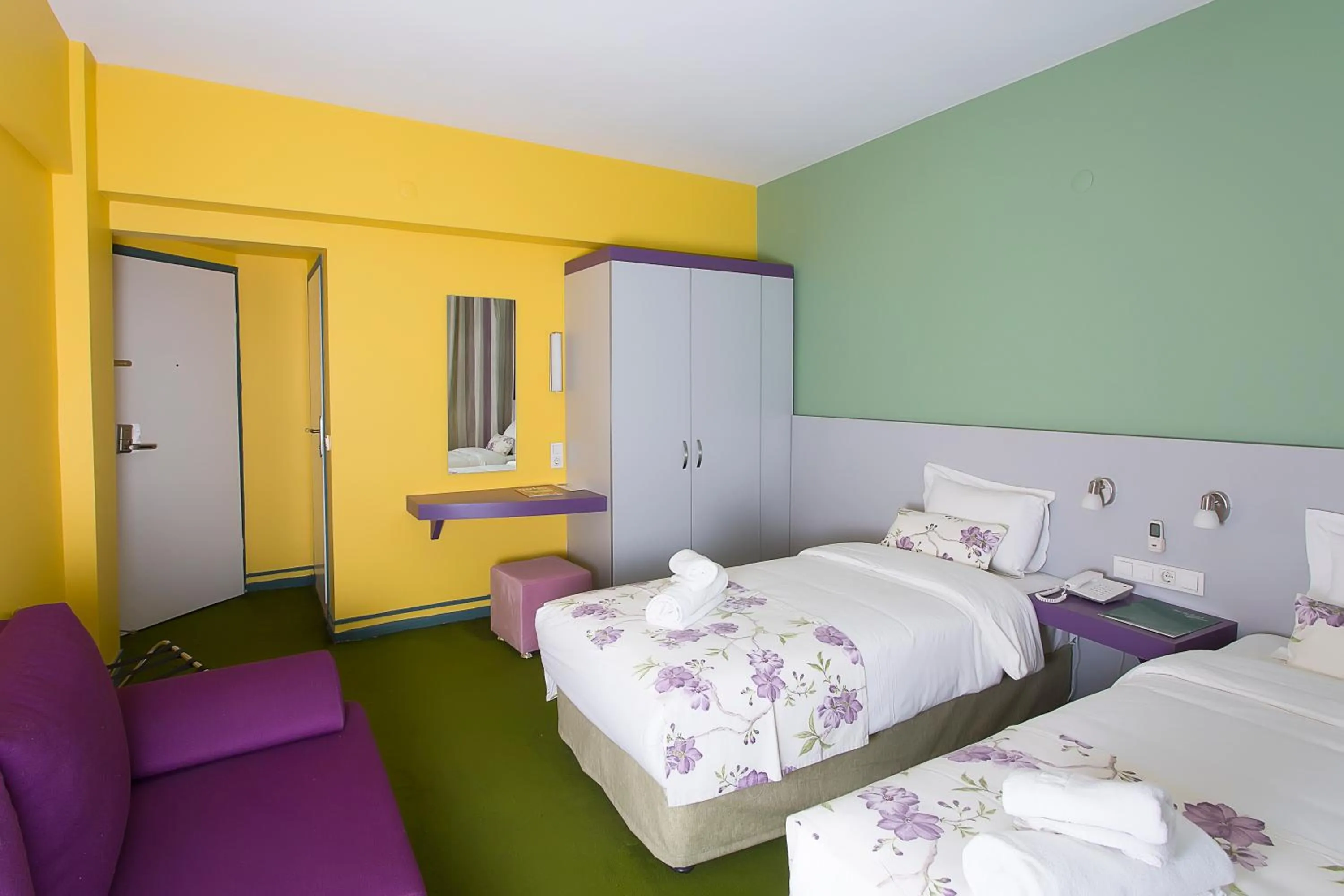 Bed in Mini Harem Hotel