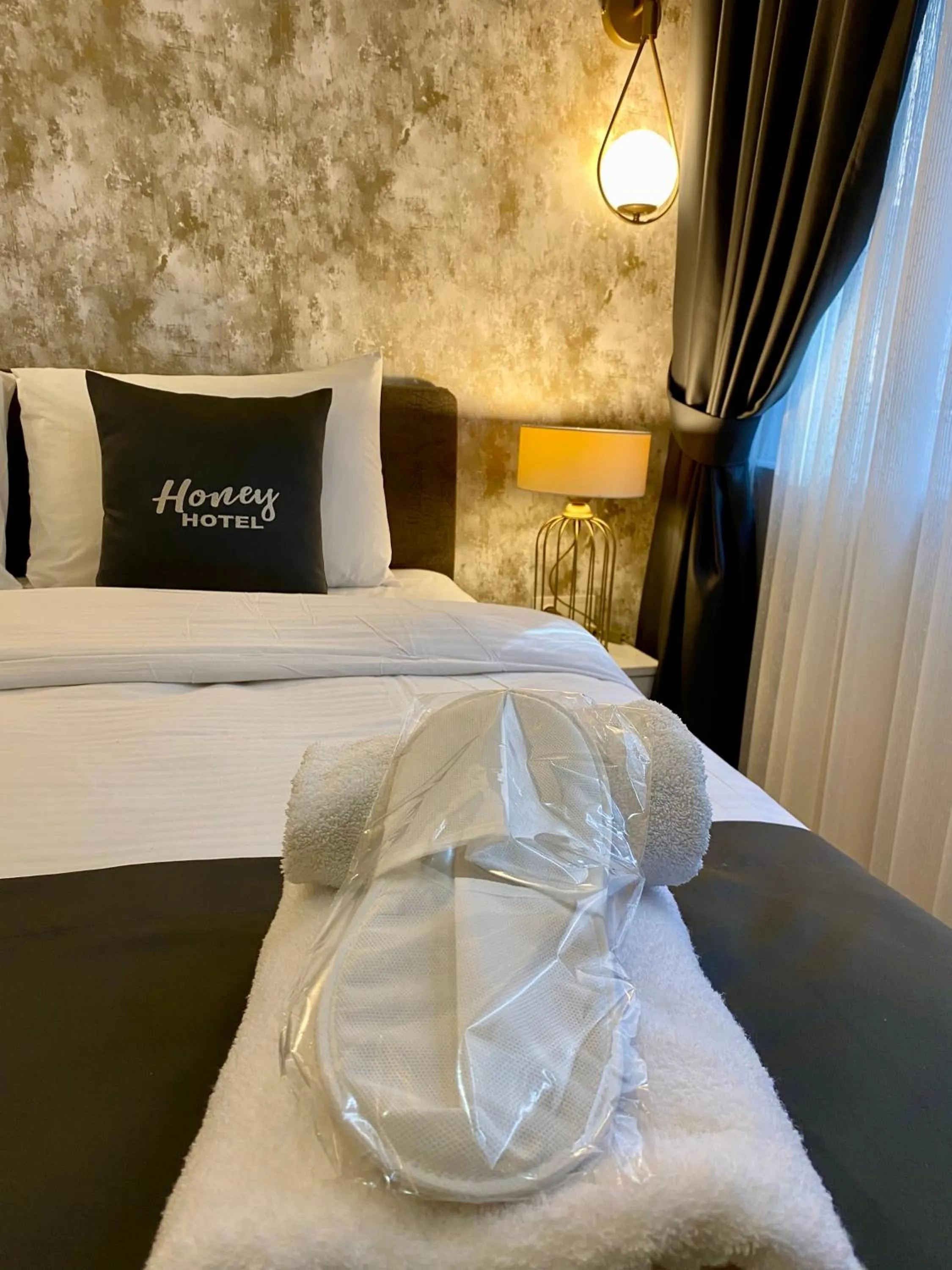 Bed in Honey Hotel