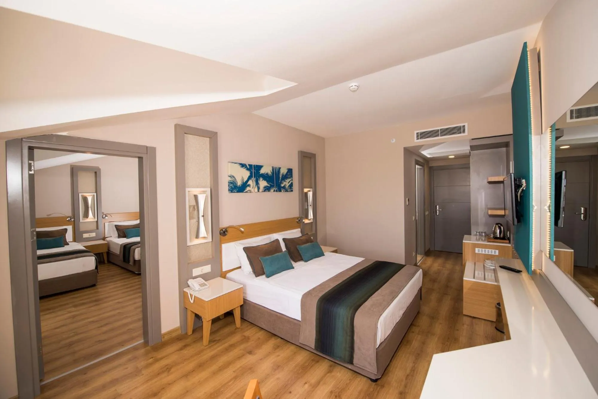 Bed in Palm World Side Resort & Spa