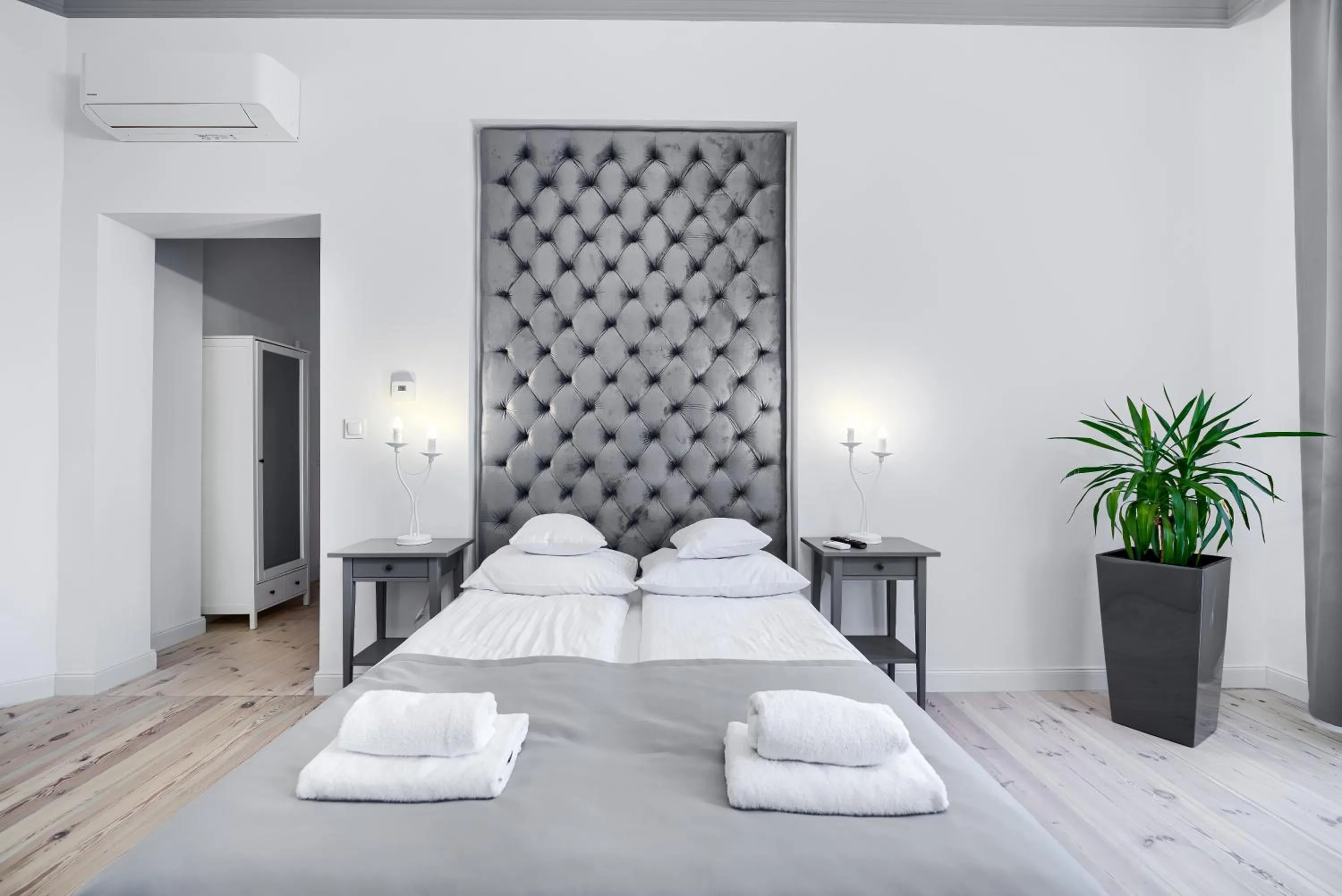 Bed in Aparthotel 1899 by Platinum