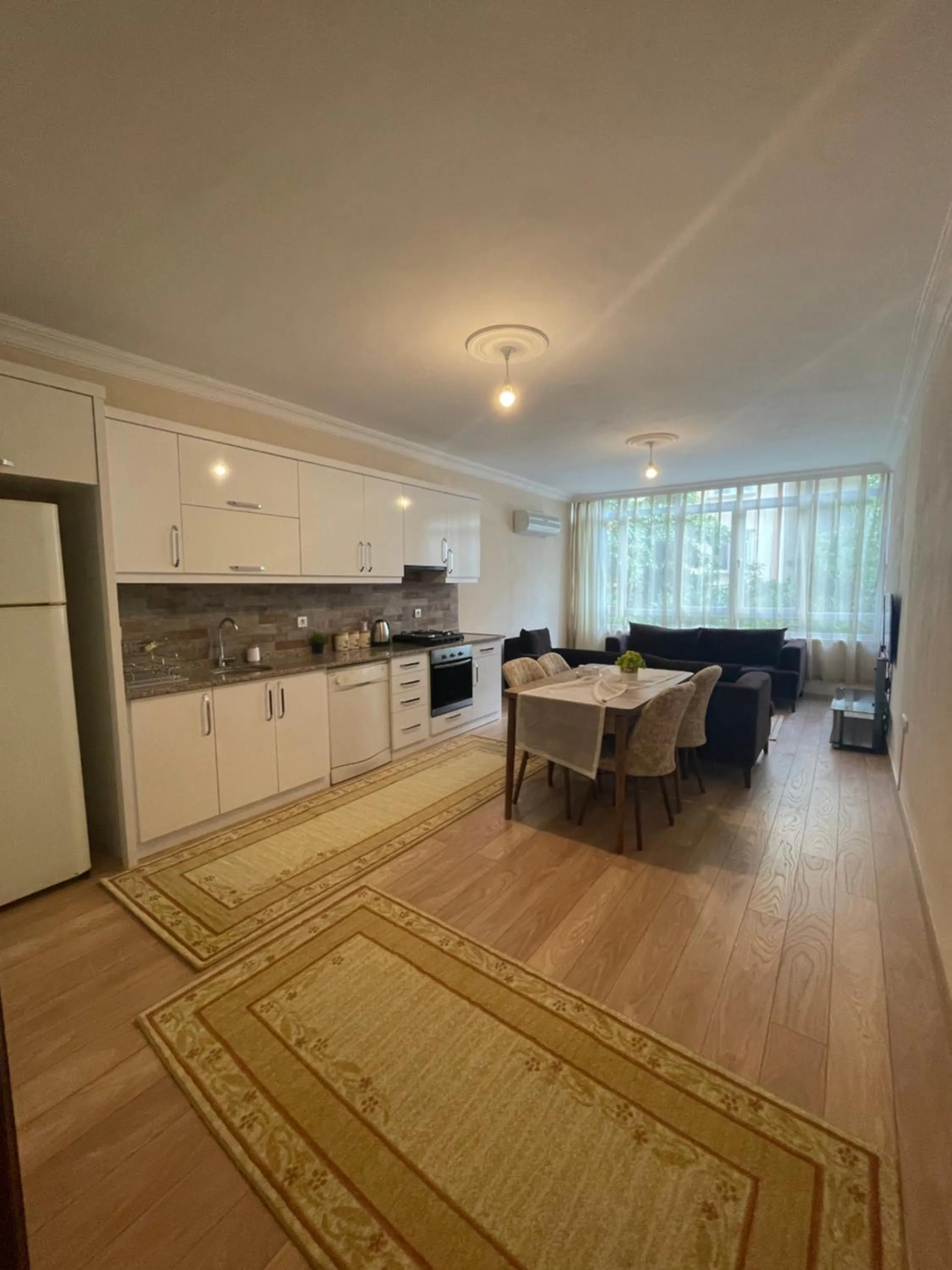 Kitchen or kitchenette in Select Suite & Apart Hotel