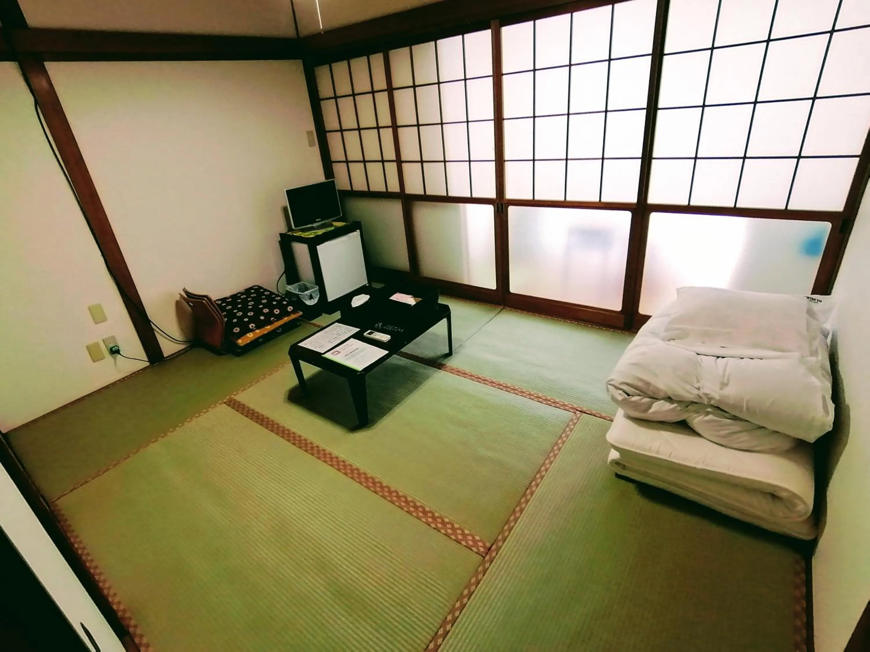 Bed in Takachiho B&B Ukigumo