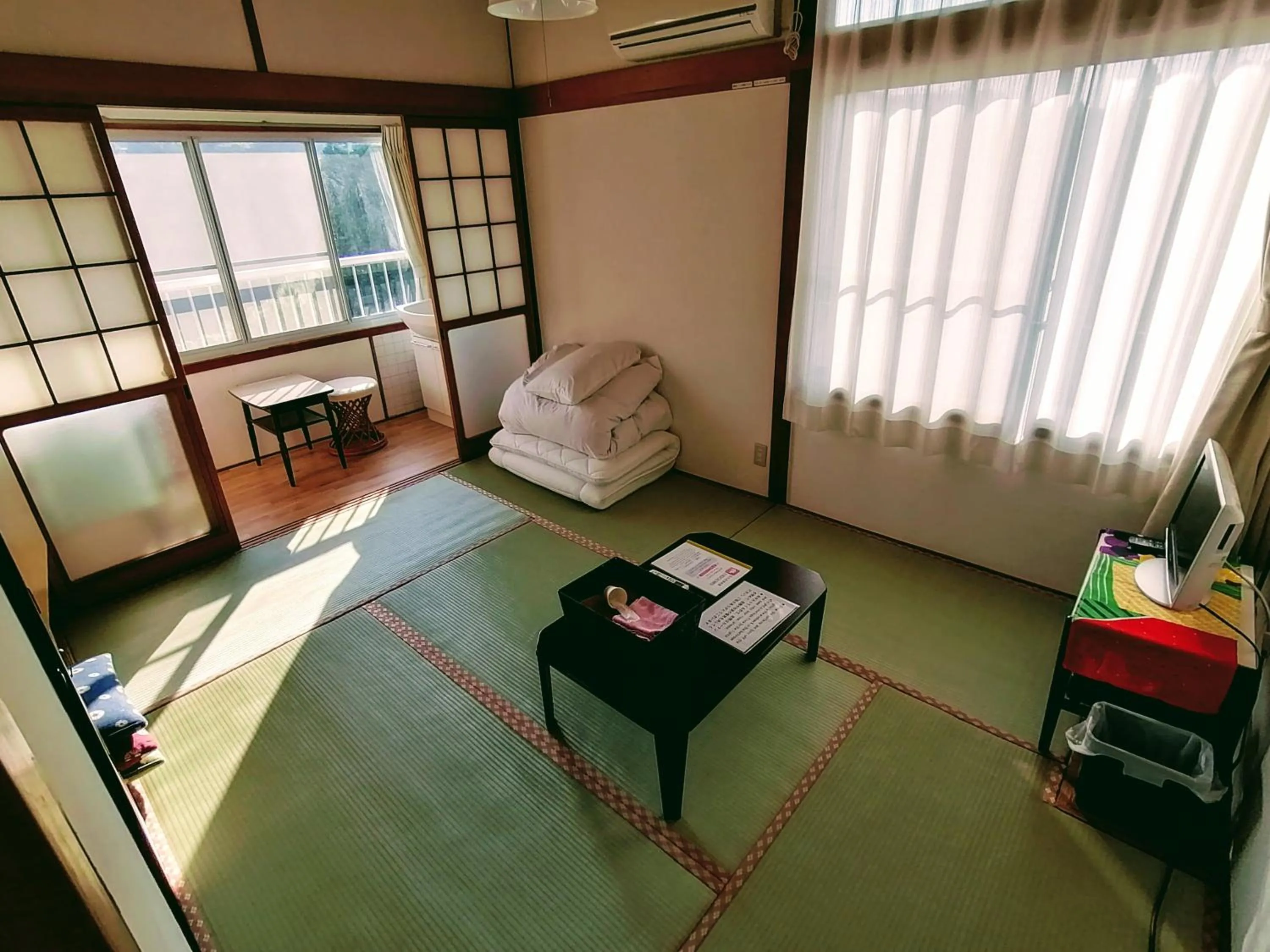 Bed in Takachiho B&B Ukigumo